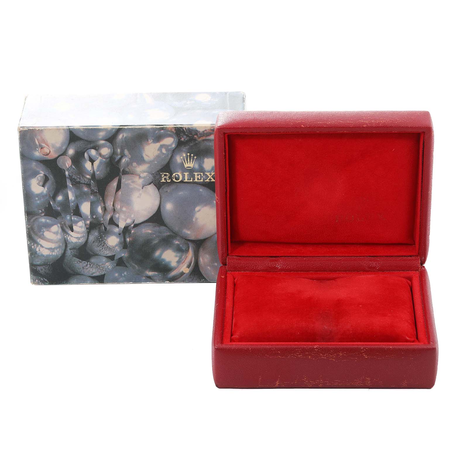 The image shows an open Rolex Datejust 69174 Women's Stainless Steel Pink Dial 69174 Women's Stainless Steel Pink Dial watch box with a red velvet interior, and a patterned outer box beside it.