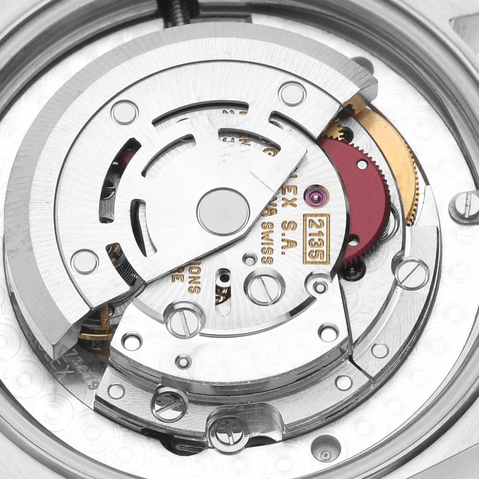 This image shows a close-up of the movement mechanism inside a Rolex Mid-Size 68273 Women's Steel and Gold (two tone) Black Dial 68273 Women's Steel and Gold (two tone) Black Dial watch, highlighting the intricate components.