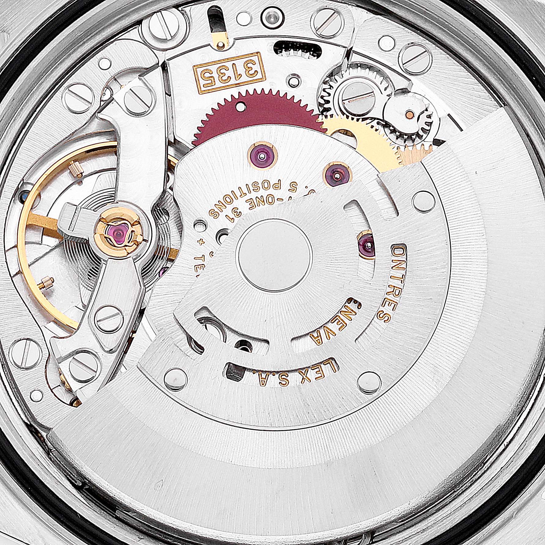 This is an internal close-up view of the Rolex Datejust 16233 Men's Steel and Gold (two tone) White Dial 16233 Men's Steel and Gold (two tone) White Dial watch movement, showing intricate gear and coil mechanisms.