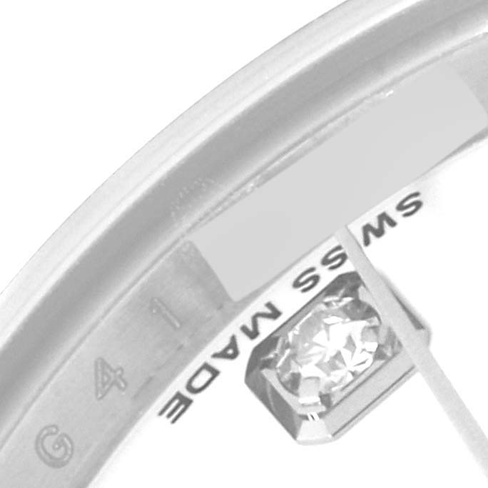 This close-up image of the Rolex Datejust 179174 Women's Stainless Steel White Dial 179174 Women's Stainless Steel White Dial watch shows part of the dial and the "SWISS MADE" marking.