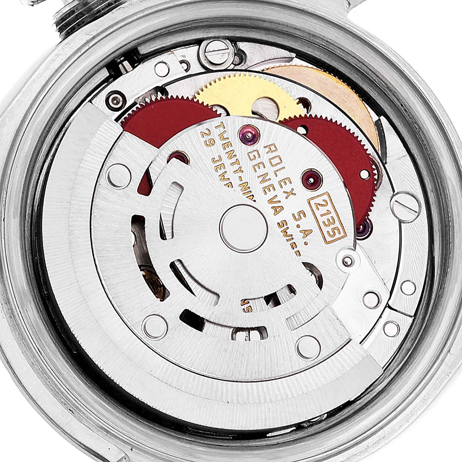This image shows the inner mechanism of a Rolex Datejust 69174 Women's Stainless Steel Silver Dial 69174 Women's Stainless Steel Silver Dial, highlighting the movement and gears.