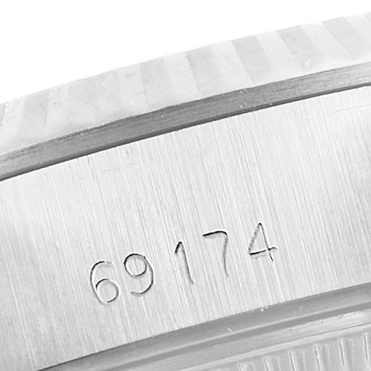 This close-up image shows the case side, displaying the reference number of a Rolex Datejust 69174 Women's Stainless Steel Silver Dial 69174 Women's Stainless Steel Silver Dial model.
