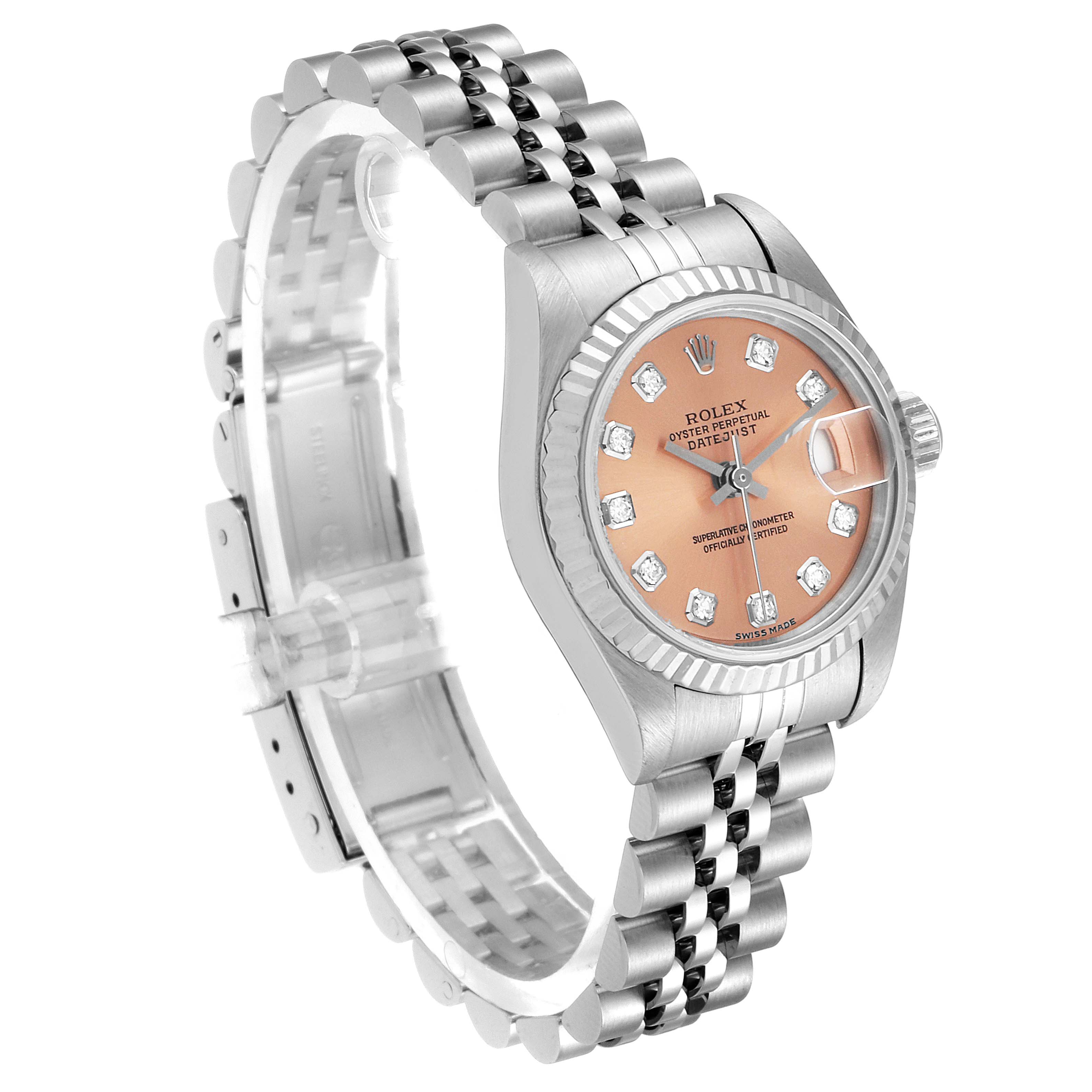 The Rolex Datejust 79174 Women's Stainless Steel Pink Dial 79174 Women's Stainless Steel Pink Dial watch is shown at a slight angle, highlighting its peach dial, fluted bezel, and Jubilee bracelet.