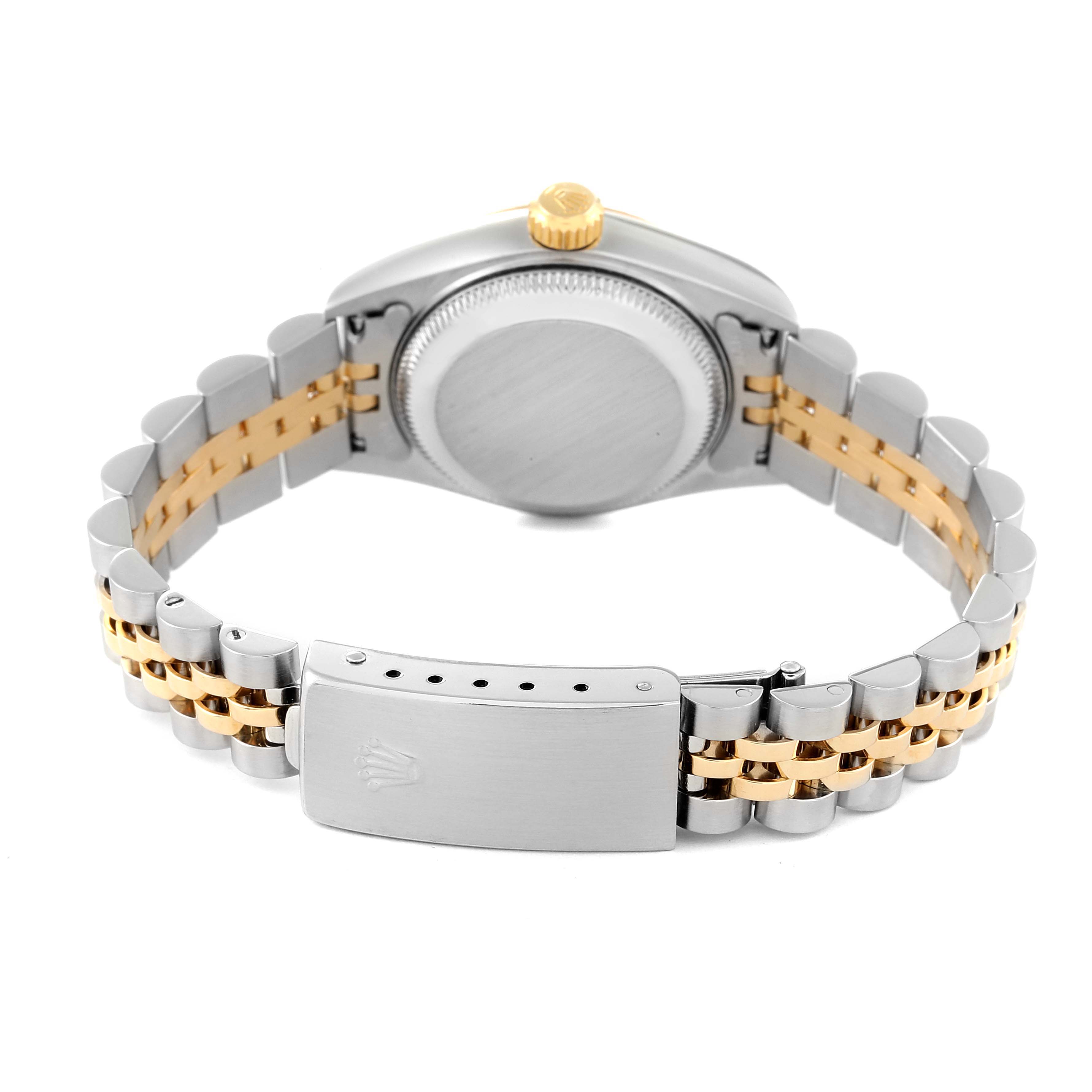 The image shows the back of the Rolex Datejust 79173 Women's Steel and Gold (two tone) Champagne Dial 79173 Women's Steel and Gold (two tone) Champagne Dial watch, including the case back, crown, and two-tone bracelet.