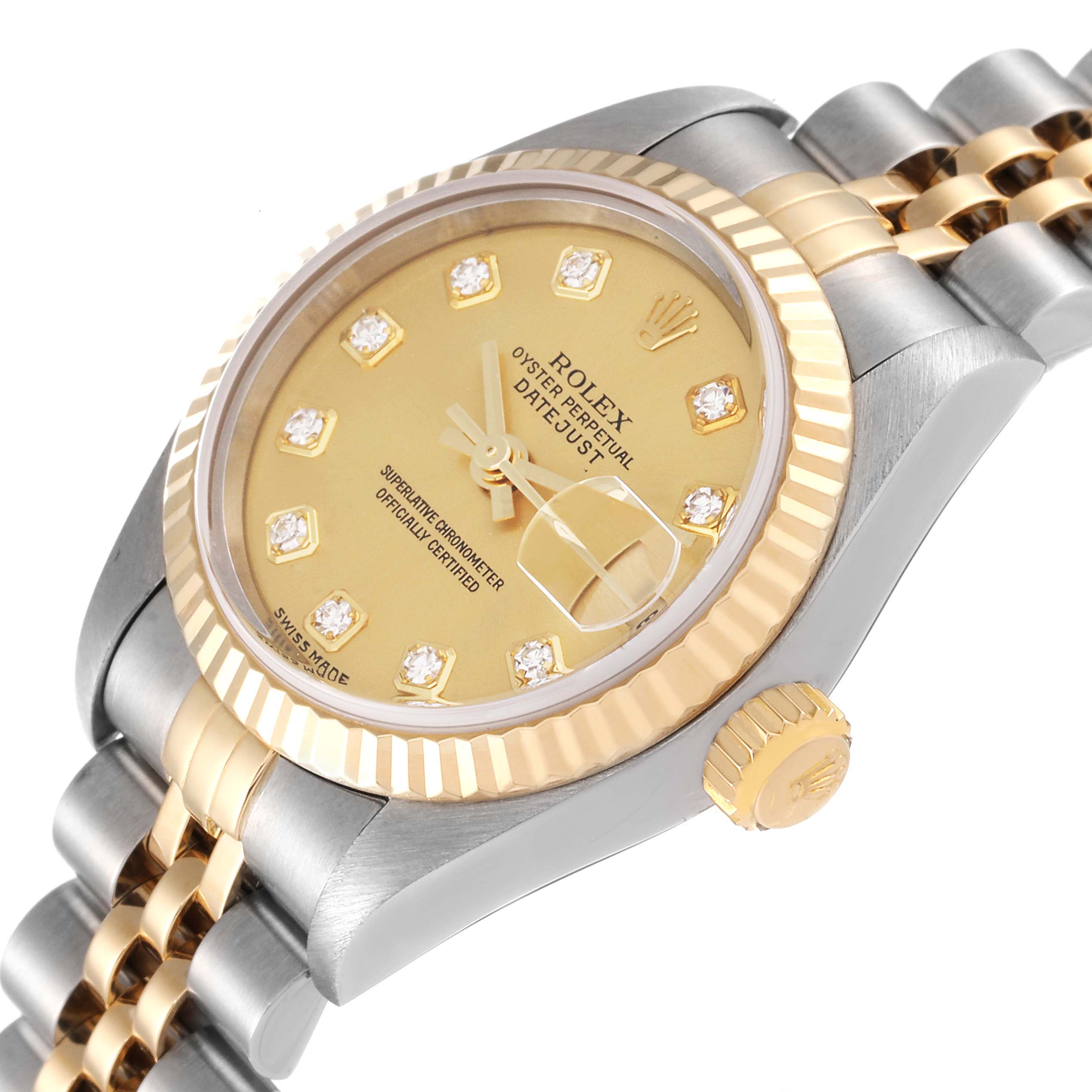 This image shows a close-up of the Rolex Datejust 79173 Women's Steel and Gold (two tone) Champagne Dial 79173 Women's Steel and Gold (two tone) Champagne Dial watch face, bezel, crown, and partially visible two-tone bracelet.