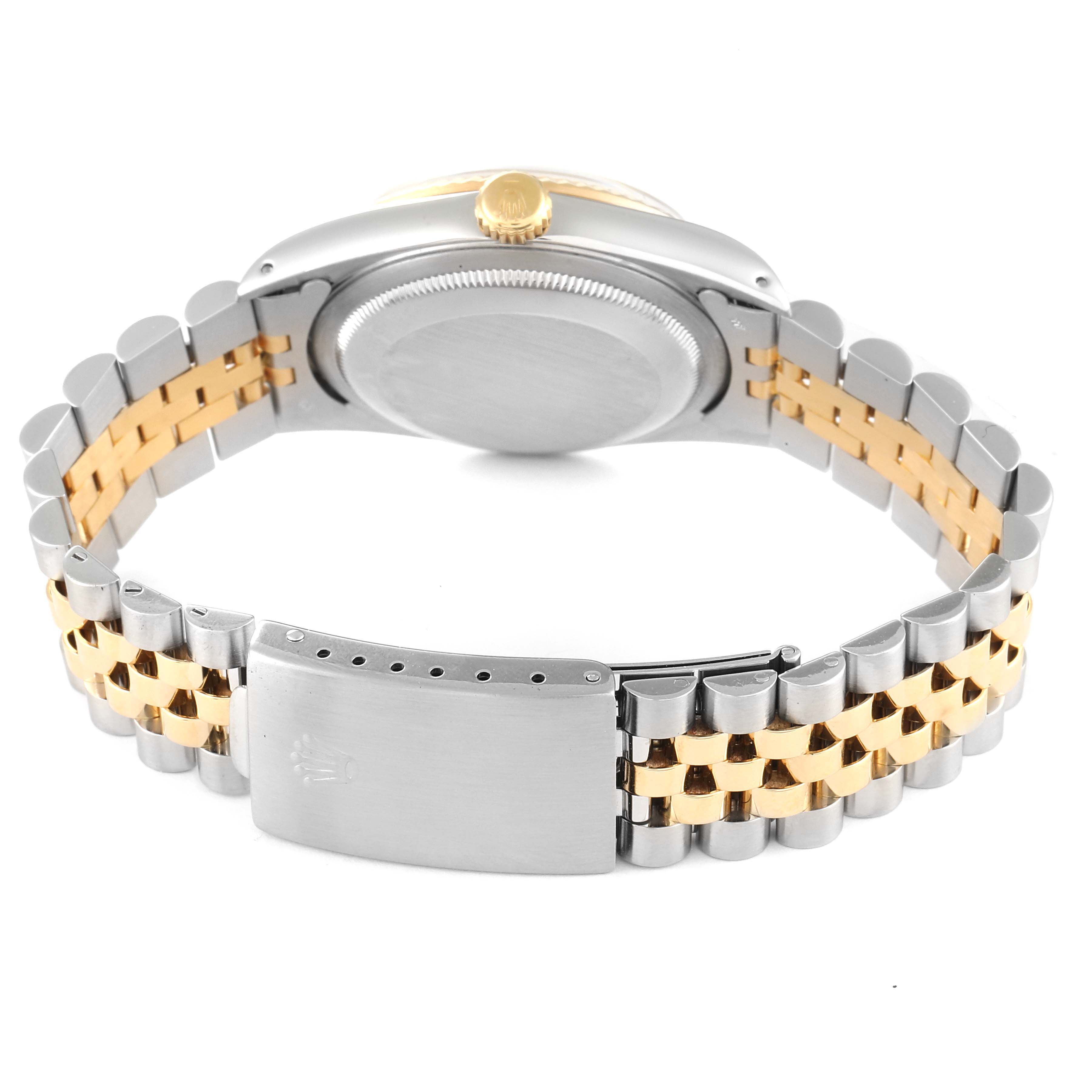 The image shows the back view of a Rolex Datejust 16233 Men's Steel and Gold (two tone) Champagne Dial 16233 Men's Steel and Gold (two tone) Champagne Dial watch, focusing on the bracelet and clasp.