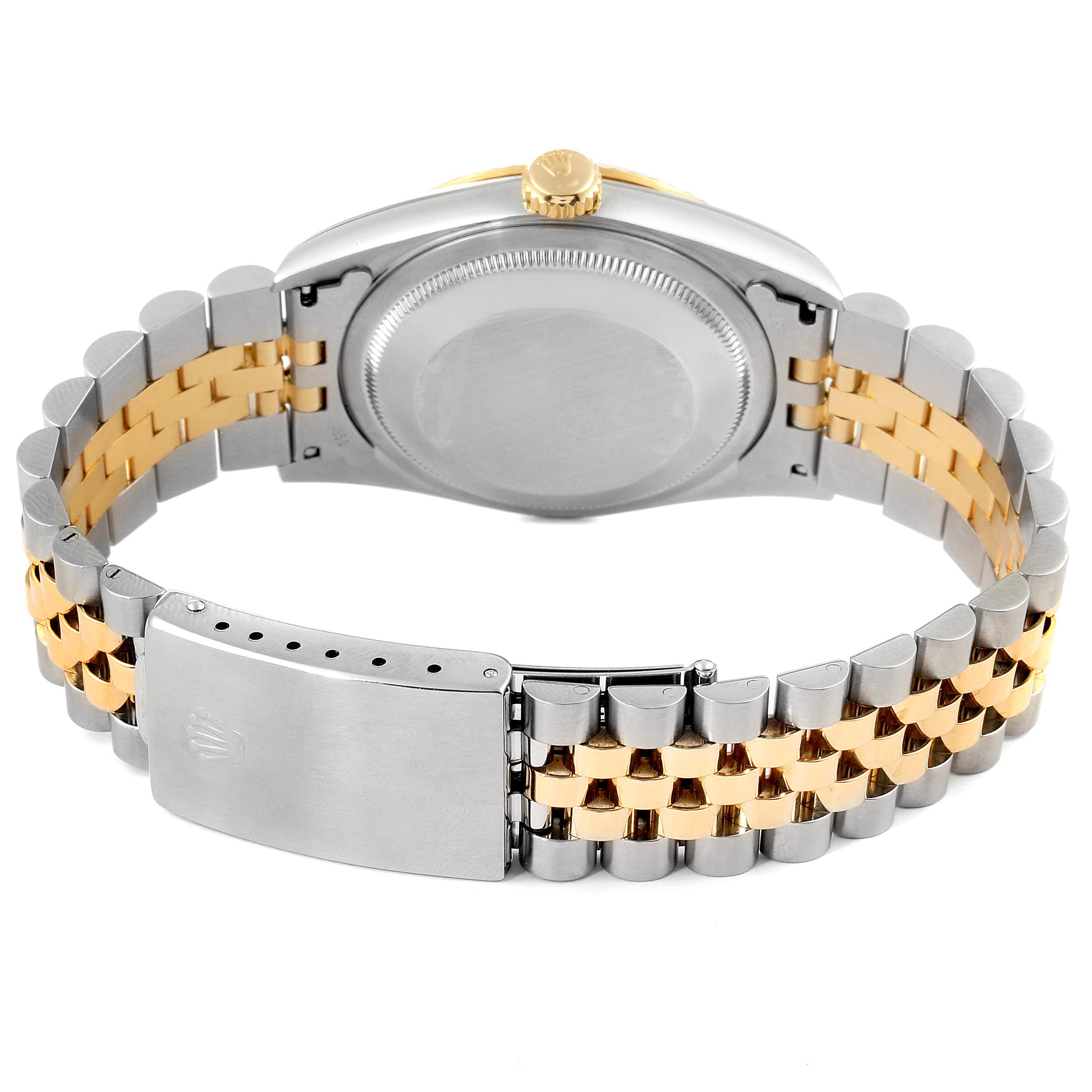 This image shows the back and bracelet of a Rolex Datejust 16233 Men's Steel and Gold (two tone) White Dial 16233 Men's Steel and Gold (two tone) White Dial watch, featuring a two-tone metal design.