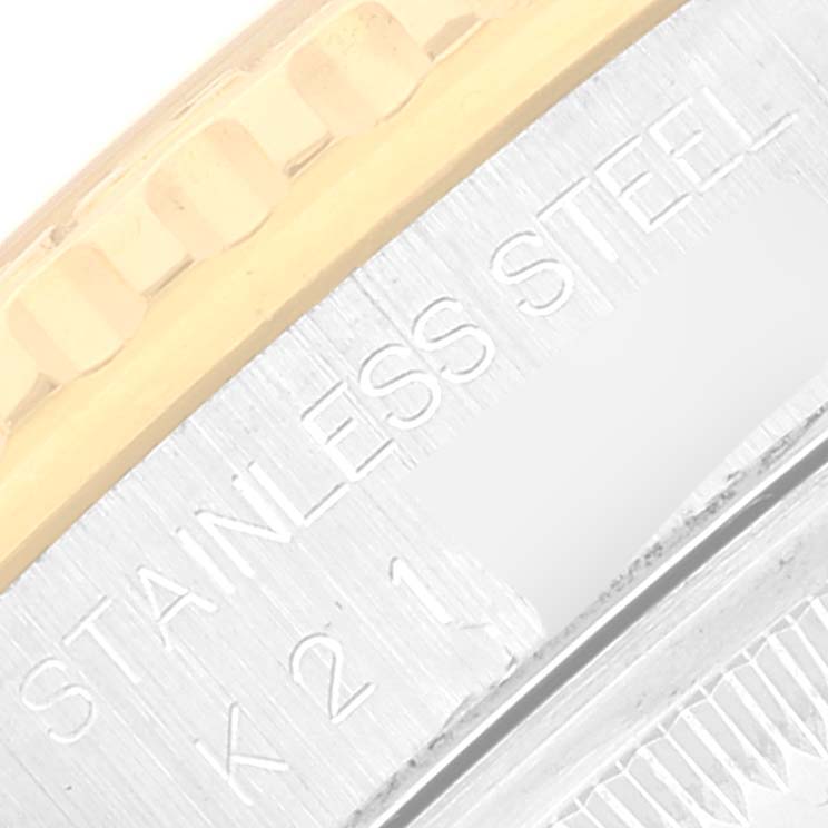 The image shows a close-up of the bezel and the engraved "STAINLESS STEEL" marking on a Rolex Turn-o-Graph 16263 Men's Steel and Gold (two tone) White Dial 16263 Men's Steel and Gold (two tone) White Dial watch.