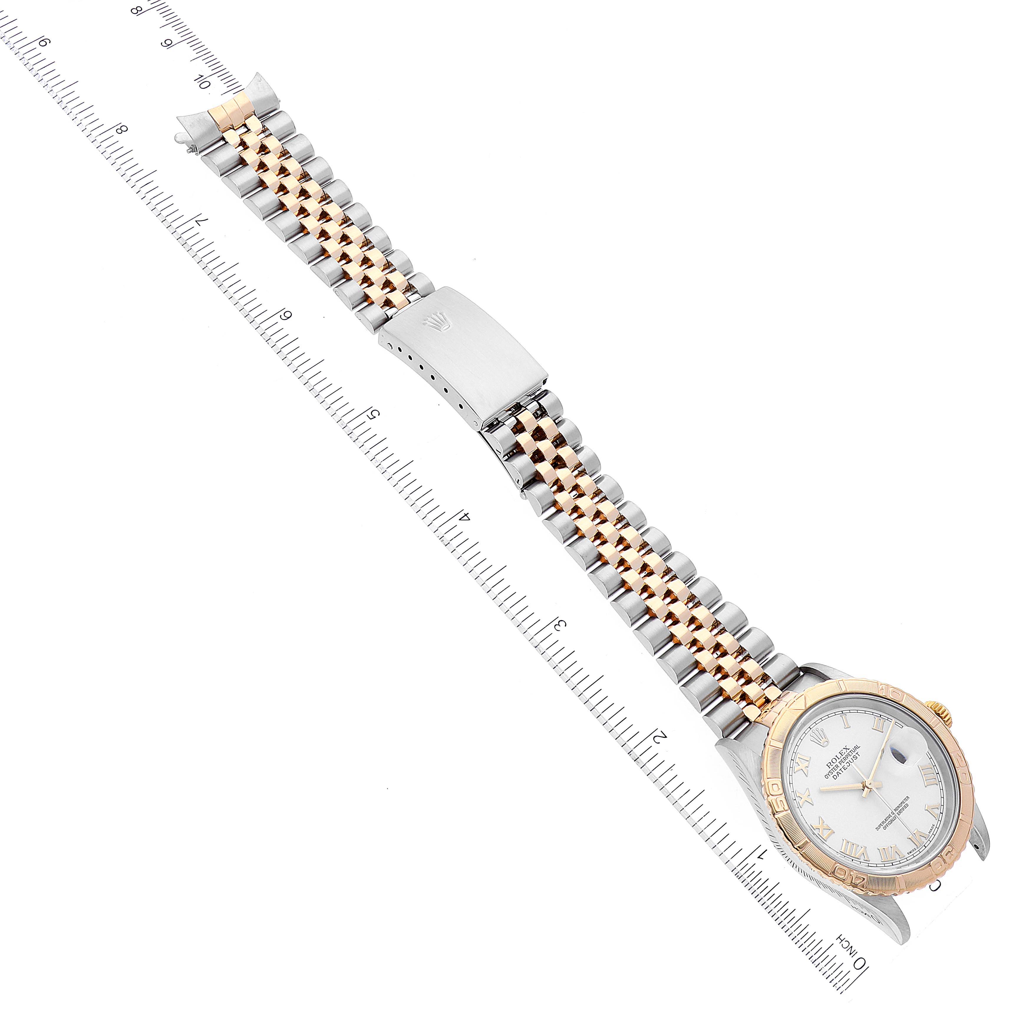 This image shows a Rolex Turn-o-Graph 16263 Men's Steel and Gold (two tone) White Dial 16263 Men's Steel and Gold (two tone) White Dial watch, displaying its dial and a two-tone metal bracelet with a measuring scale.