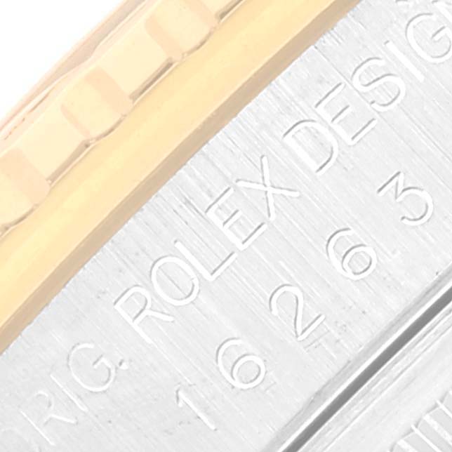 The image shows a close-up of the bezel and case side of a Rolex Turn-o-Graph 16263 Men's Steel and Gold (two tone) White Dial 16263 Men's Steel and Gold (two tone) White Dial watch displaying its etched model number.