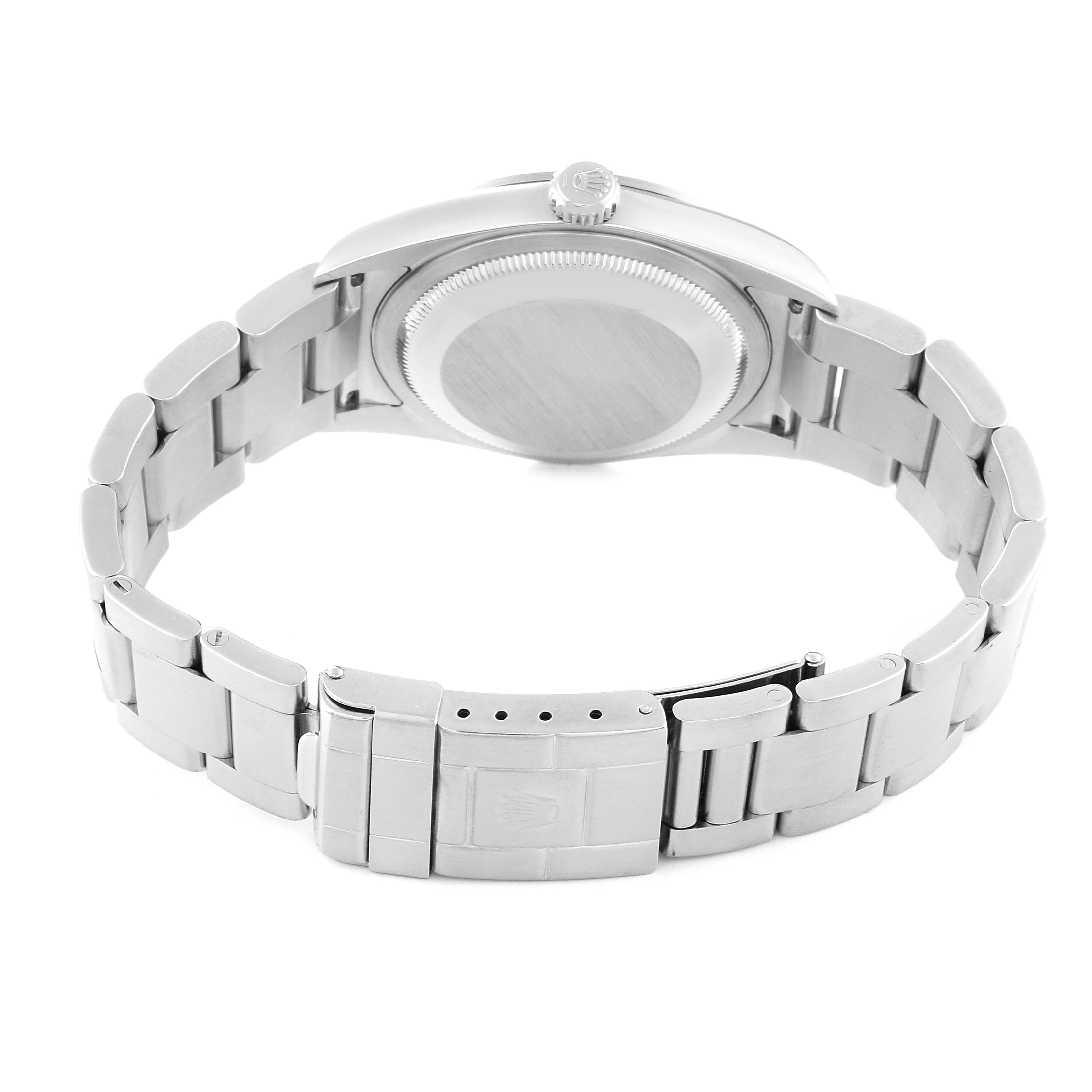 The image shows the back view of a Rolex Explorer 114270 Men
s Stainless Steel Black Dial 114270 Men
s Stainless Steel Black Dial model watch, with the bracelet and clasp visible.