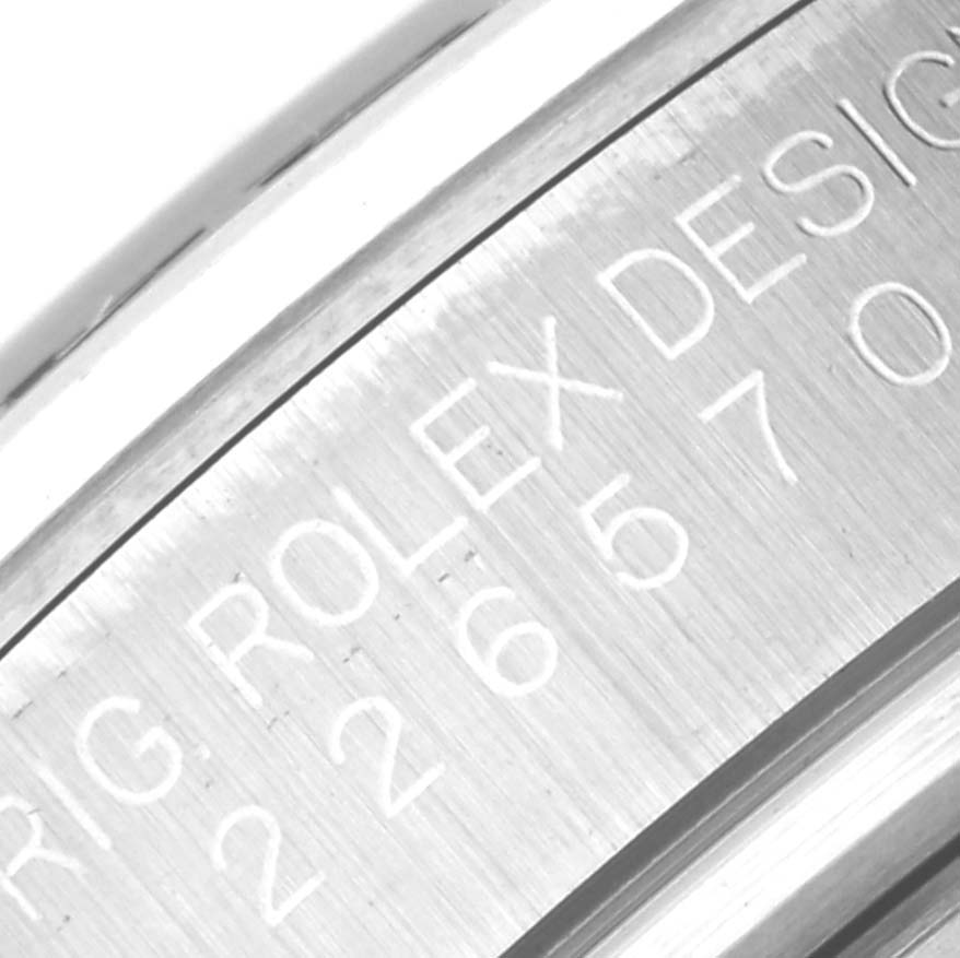 This close-up image shows the engraved side of the case for the Rolex Explorer 226570 Men
s Stainless Steel Black Dial 226570 Men
s Stainless Steel Black Dial model.
