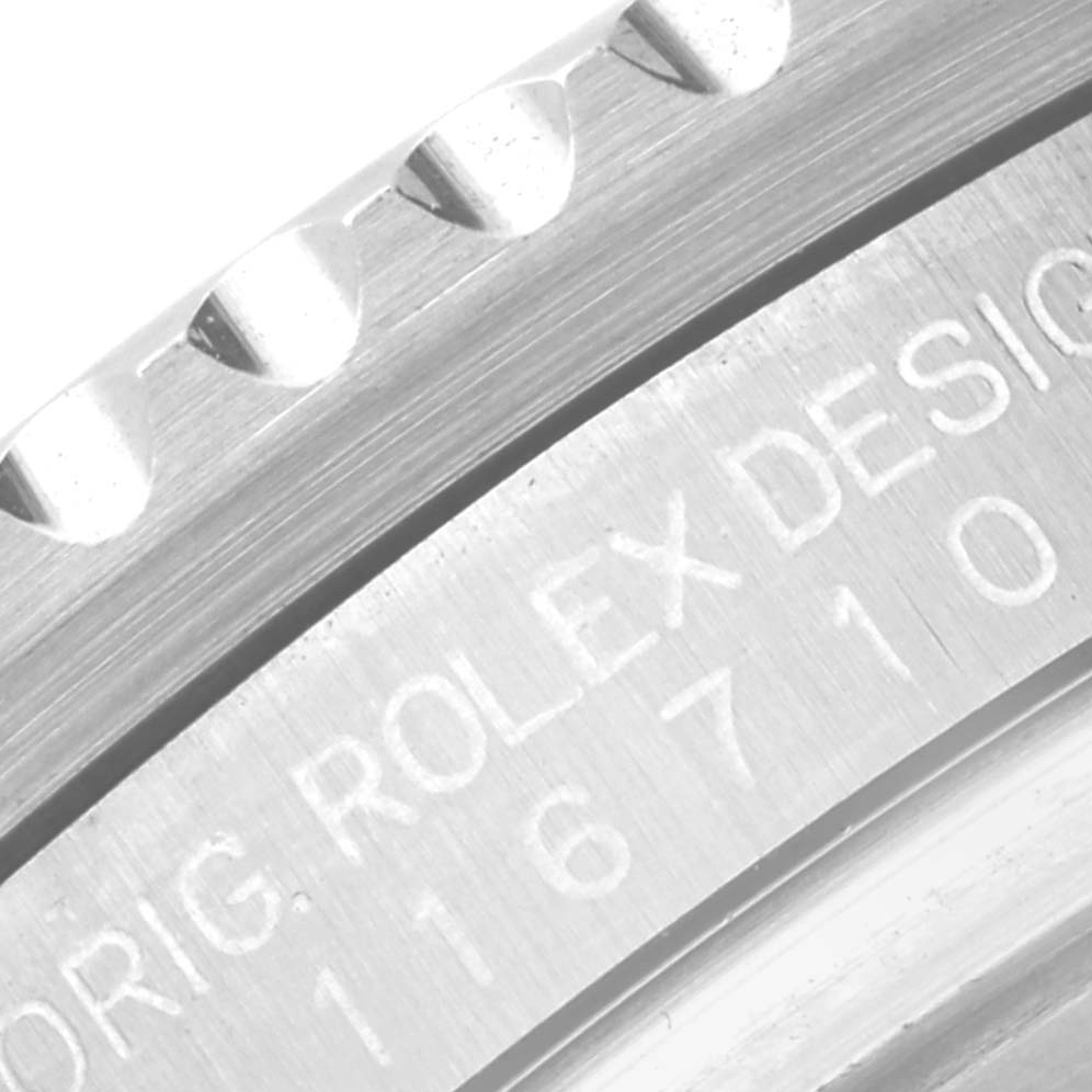 This image shows a close-up of the engraved bezel and case side of a Rolex GMT-Master 116710LN Men
s Stainless Steel Black Dial 116710LN Men
s Stainless Steel Black Dial watch.