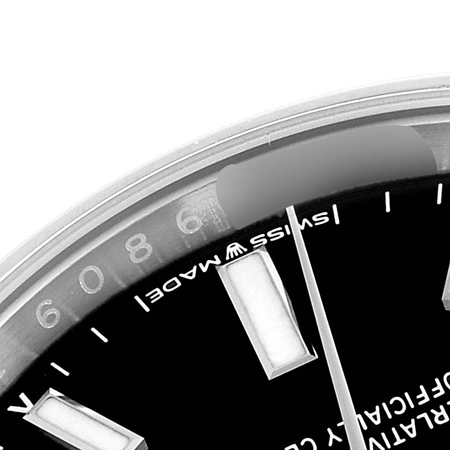 This image shows a close-up of the dial, hour markers, and part of the bezel of a Rolex Oyster Perpetual 124200 Men's Stainless Steel Black Dial 124200 Men's Stainless Steel Black Dial watch.