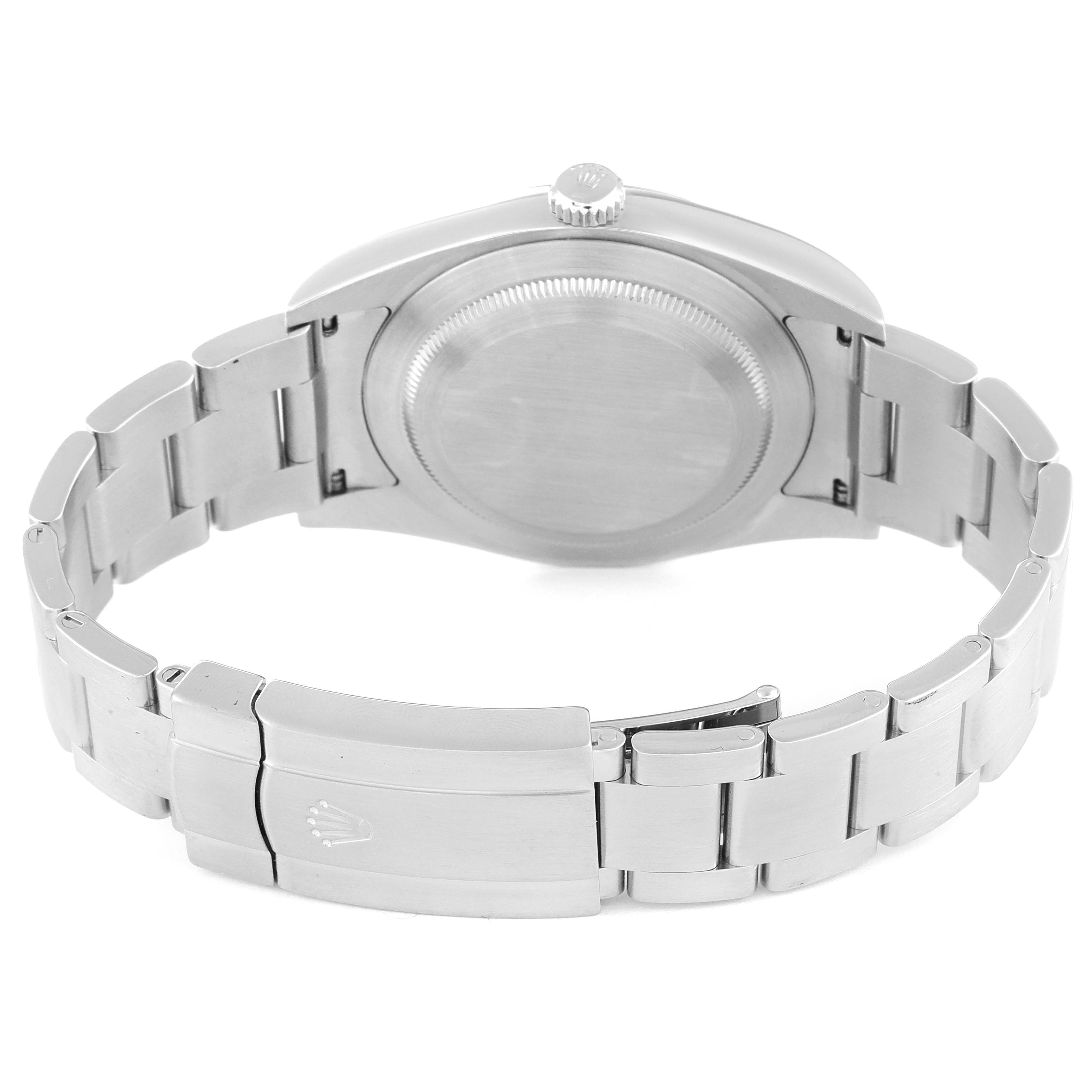 The image shows the back and bracelet of a Rolex Oyster Perpetual 114300 Men's Stainless Steel Grey Dial 114300 Men's Stainless Steel Grey Dial watch, highlighting the clasp and caseback.