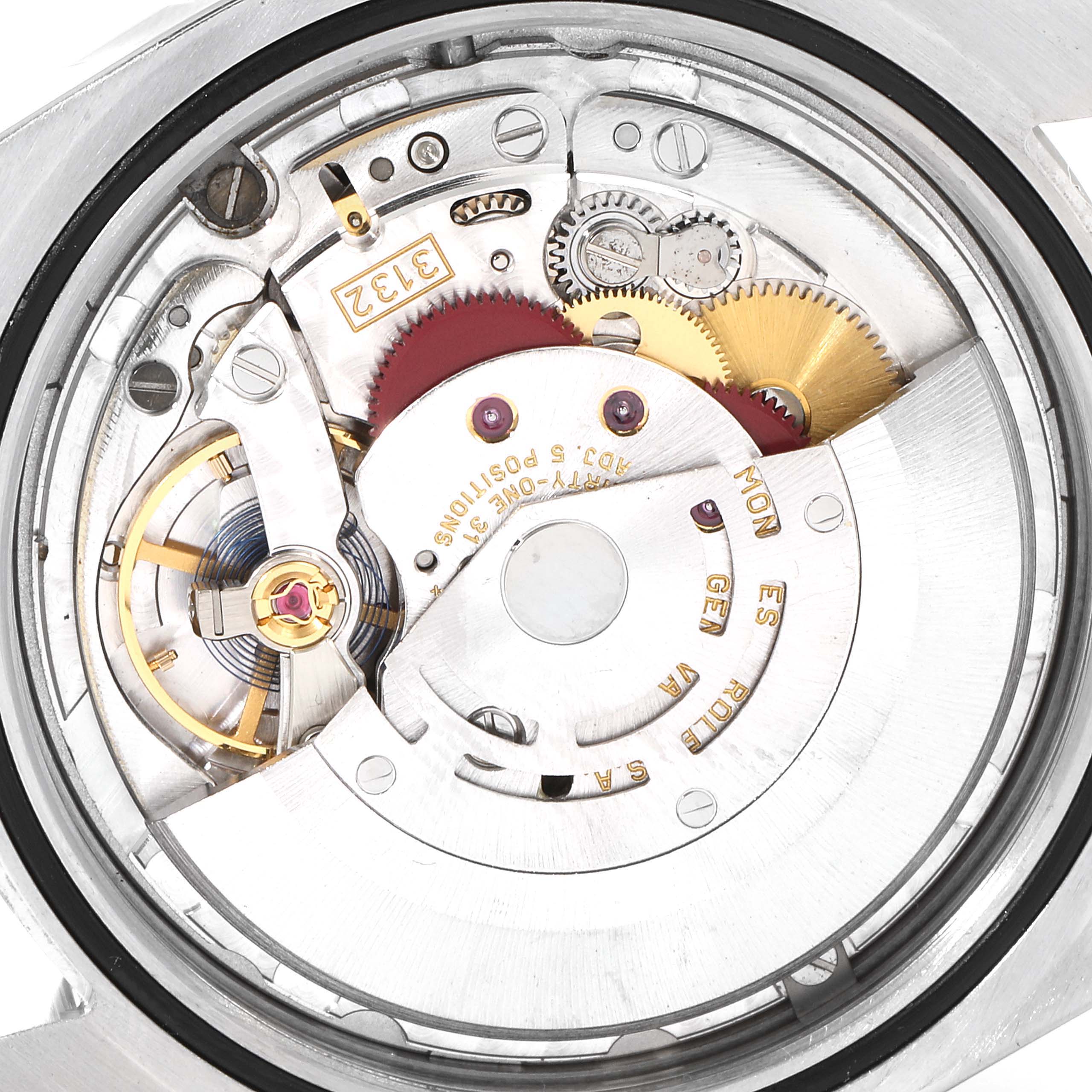 This image shows the inner mechanical components of the Rolex Oyster Perpetual 114300 Men's Stainless Steel Grey Dial 114300 Men's Stainless Steel Grey Dial watch from a close-up angle.