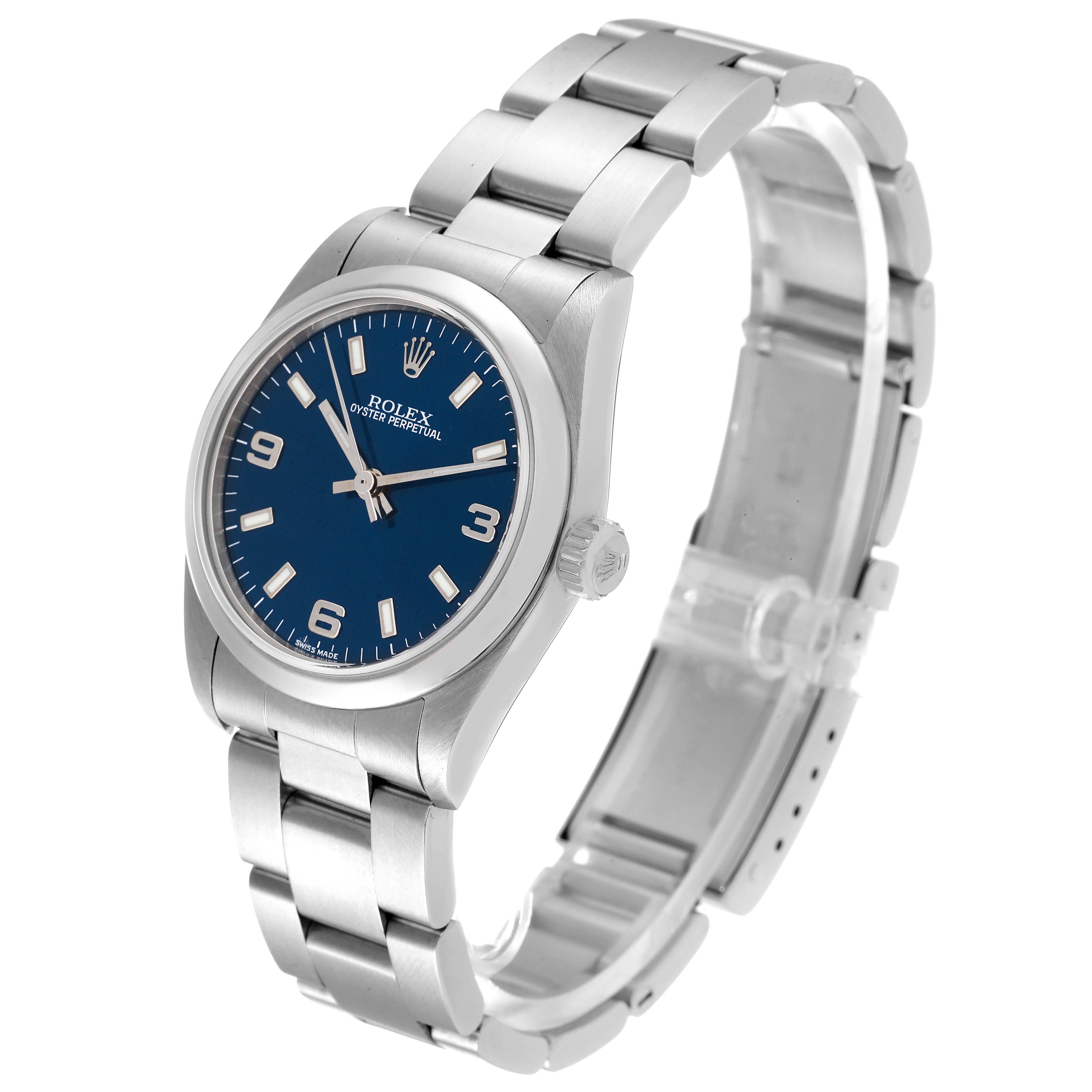 The Rolex Mid-Size 77080 Women
s Stainless Steel Blue Dial 77080 Women
s Stainless Steel Blue Dial model Oyster Perpetual watch is shown at a three-quarter angle, displaying the dial, crown, and bracelet.