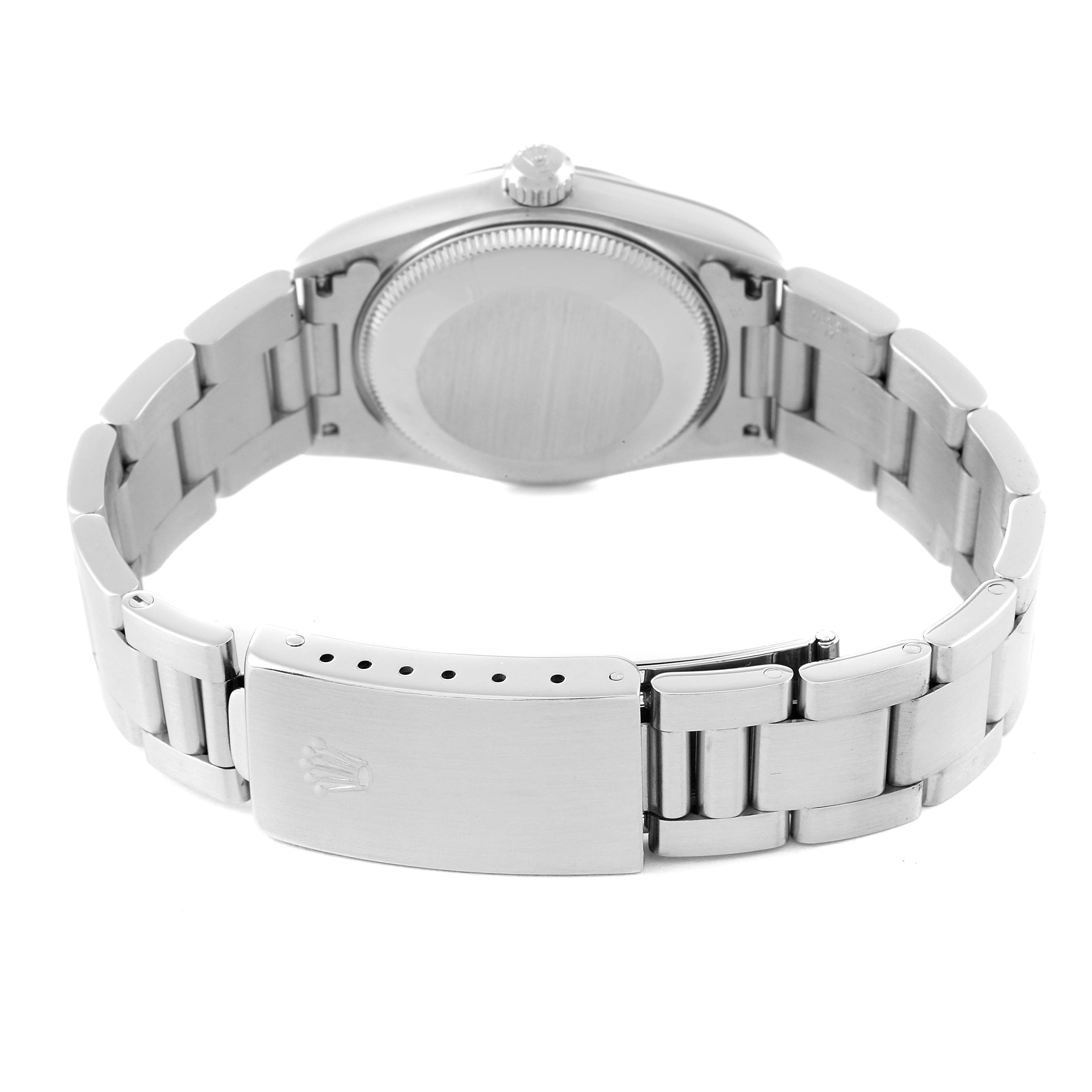 The image shows the back of a Mid-Size Rolex watch, focusing on the case back and the bracelet with the clasp.