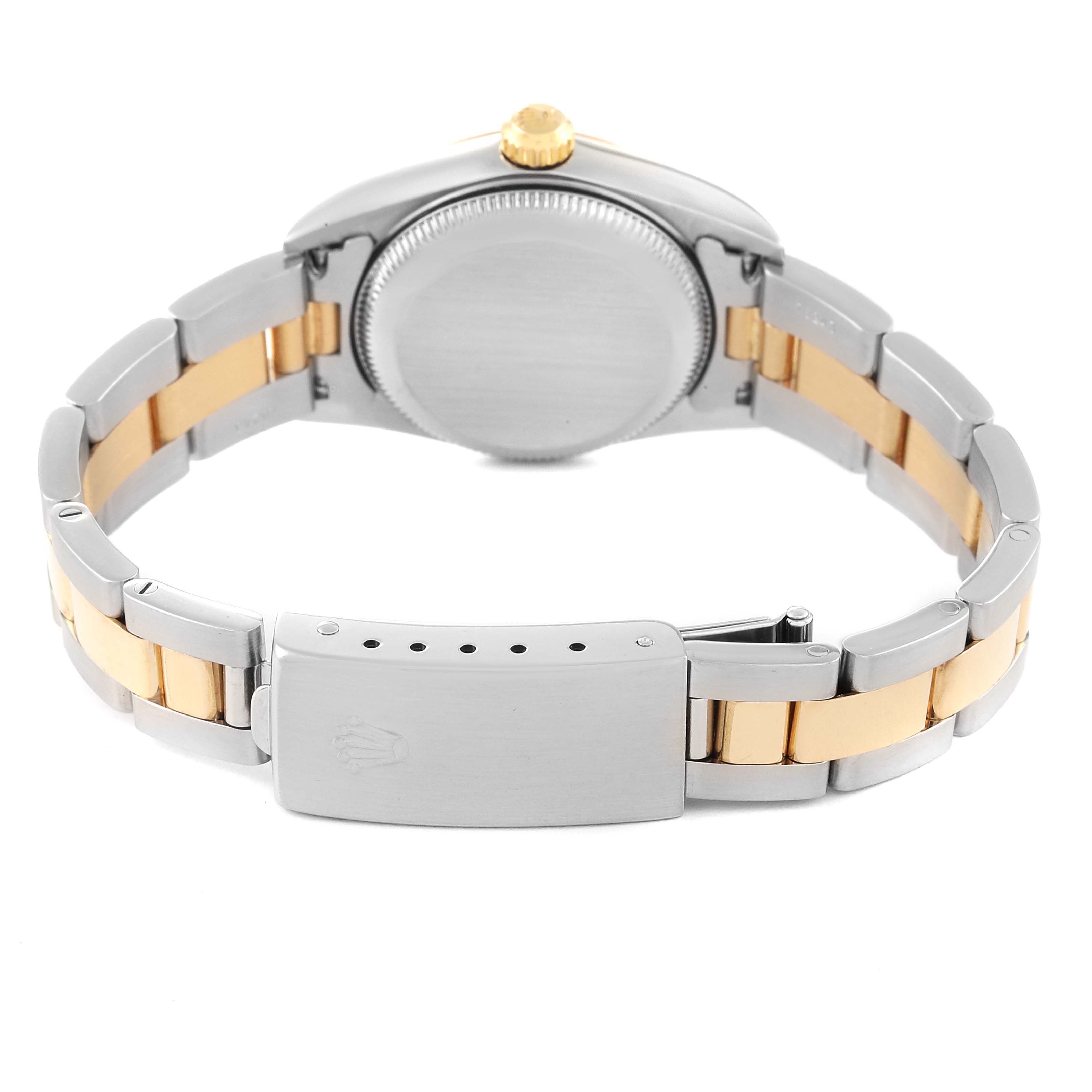 This image shows the back view of a Rolex Oyster Perpetual 76183 Women's Steel and Gold (two tone) Grey Dial 76183 Women's Steel and Gold (two tone) Grey Dial watch including the caseback, crown, and two-tone metal bracelet.