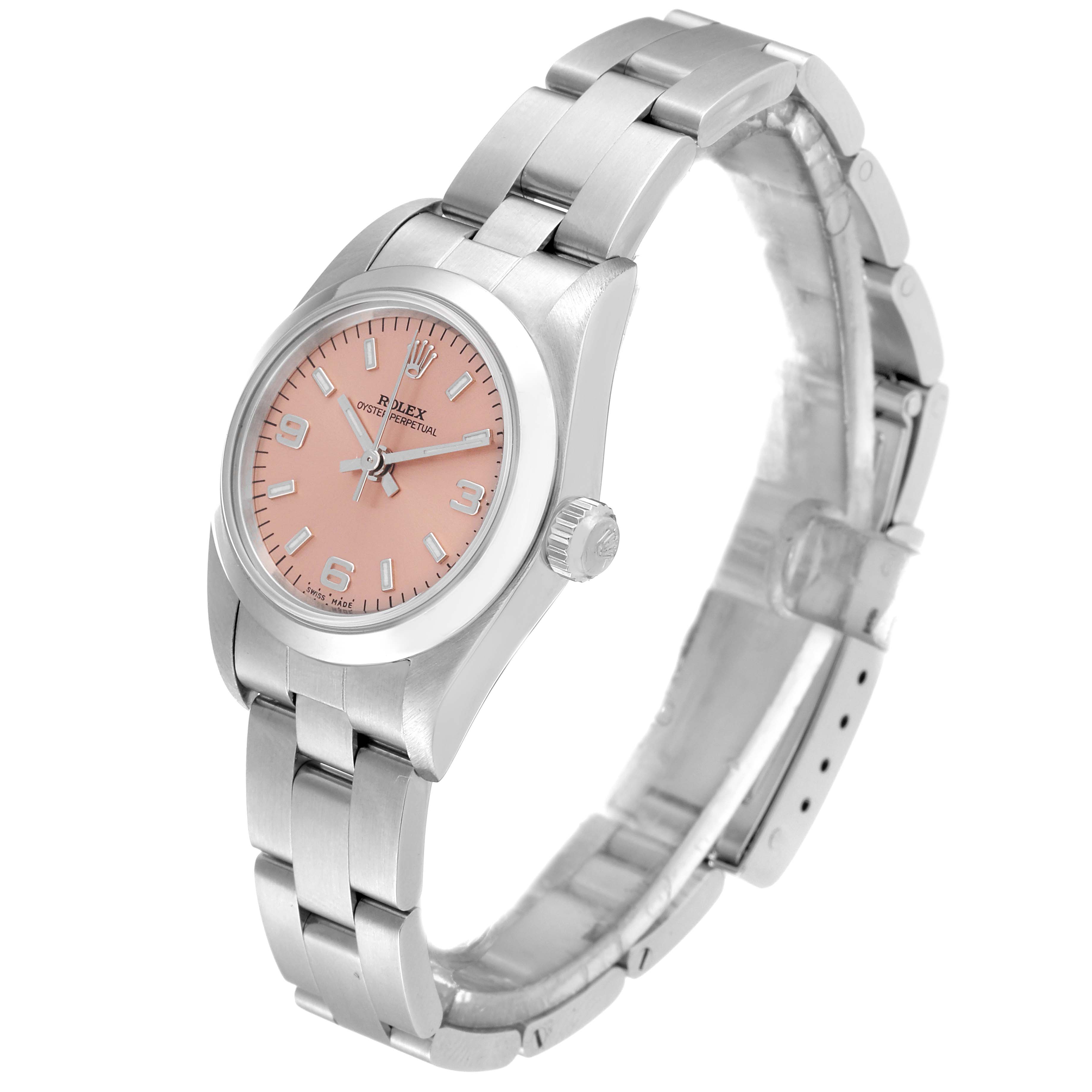The Rolex Oyster Perpetual 76080 Women
s Stainless Steel Pink Dial 76080 Women
s Stainless Steel Pink Dial watch is shown at a slight angle, highlighting its silver strap, case, and pink dial.