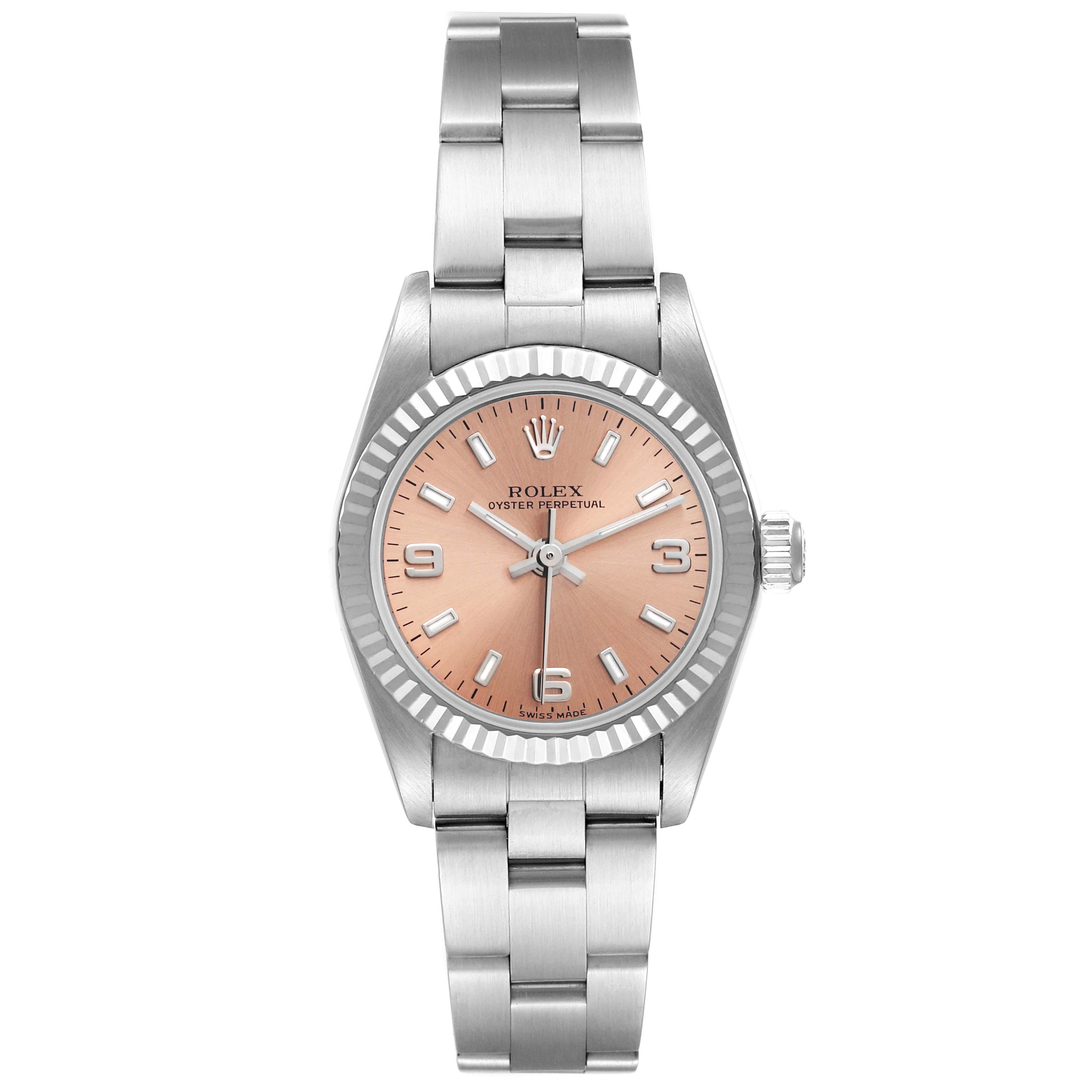 This image shows a front view of a Rolex Oyster Perpetual 76094 Women
s Stainless Steel Pink Dial 76094 Women
s Stainless Steel Pink Dial watch, displaying its dial, bezel, and bracelet.
