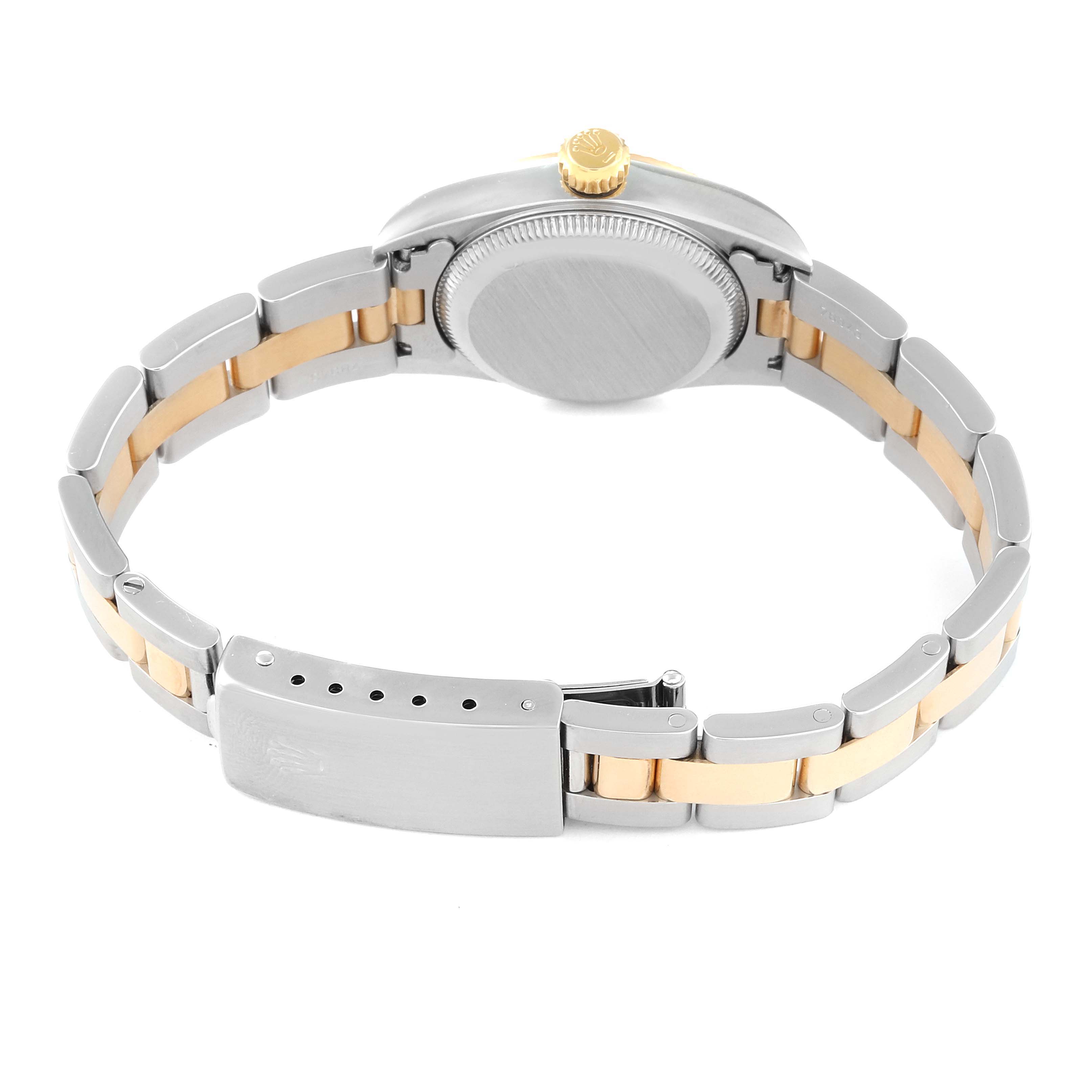 The image shows the back view of a Rolex Oyster Perpetual 67193 Women's Steel and Gold (two tone) Champagne Dial 67193 Women's Steel and Gold (two tone) Champagne Dial watch, highlighting the two-tone bracelet and clasp.