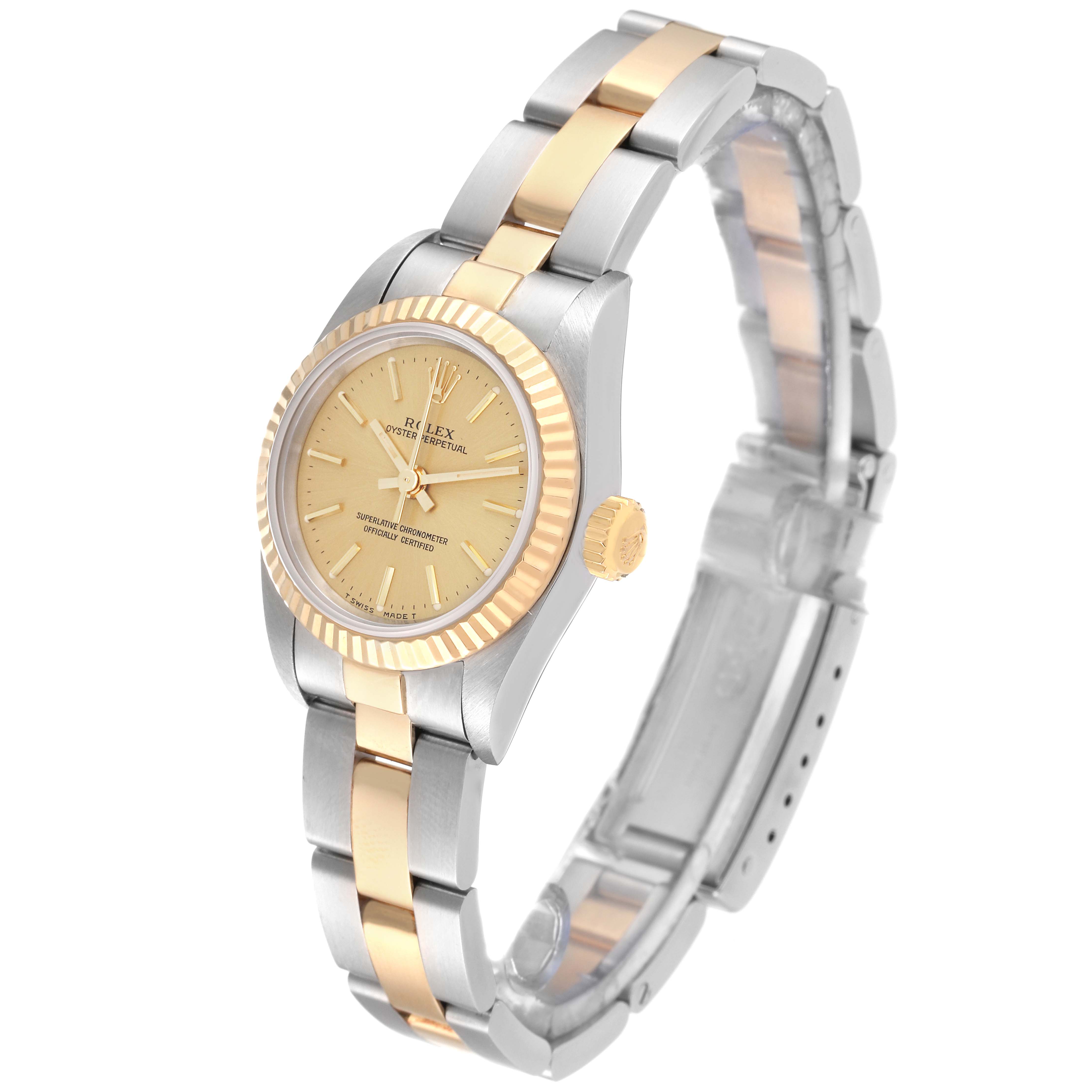 The image shows a Rolex Oyster Perpetual 67193 Women's Steel and Gold (two tone) Champagne Dial 67193 Women's Steel and Gold (two tone) Champagne Dial watch, viewed at a slight angle from the front, displaying the face, bezel, and part of the bracelet.