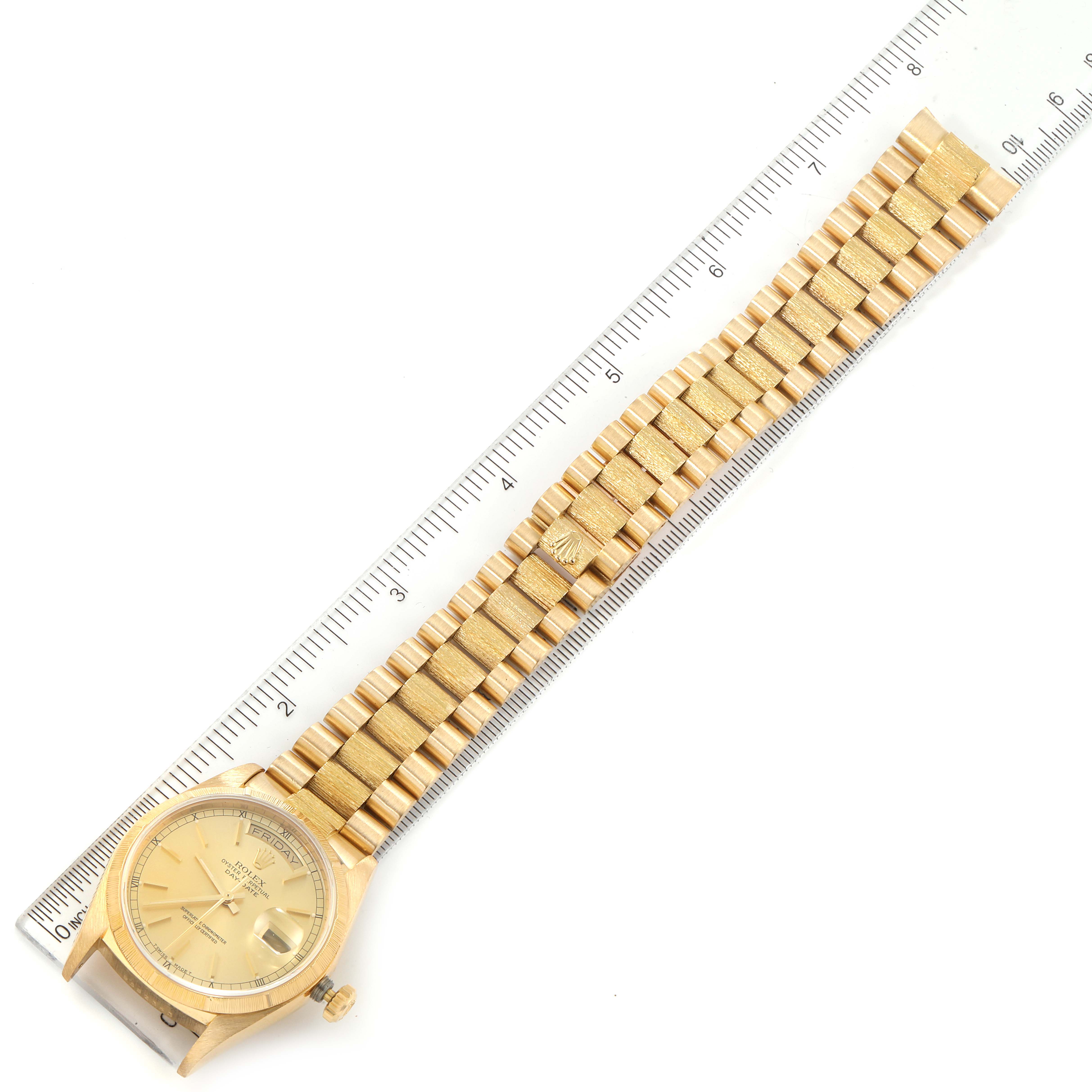 The image shows a Rolex President 18078 Men's Yellow Gold Champagne Dial 18078 Men's Yellow Gold Champagne Dial model watch face and bracelet, measured against a ruler.