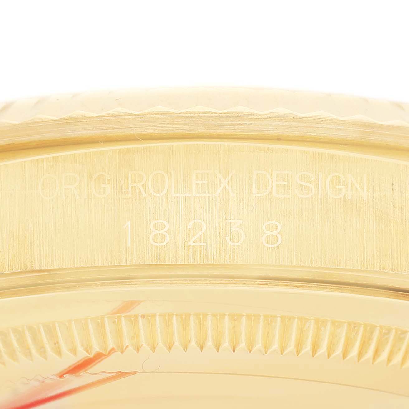 The image shows a close-up angle of the side of the Rolex President 18238 Men's Yellow Gold Champagne Dial watch, focusing on the engraved model number.