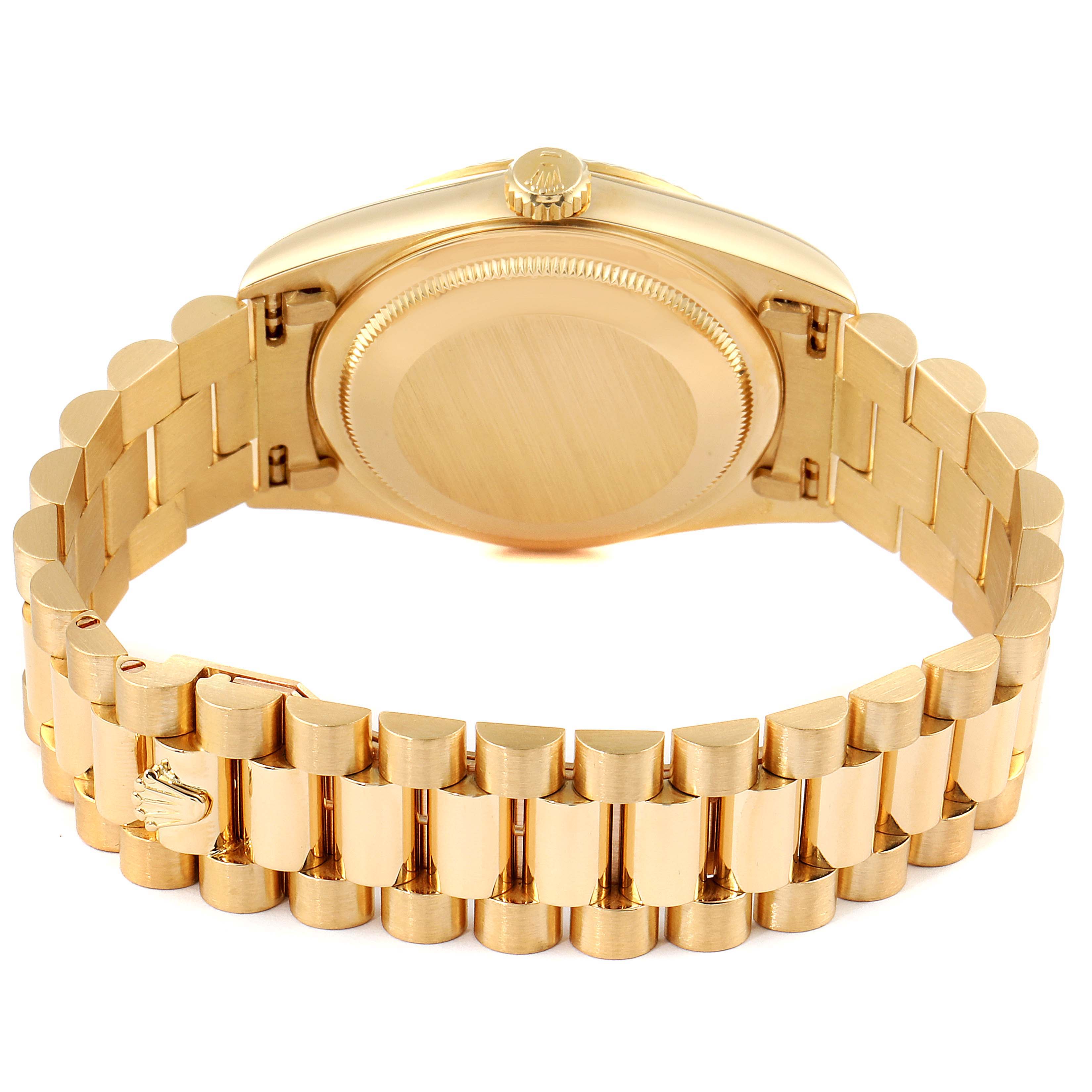 The image shows the back view of a Rolex President 18238 Men's Yellow Gold Champagne Dial 18238 Men's Yellow Gold Champagne Dial model watch, highlighting the caseback, crown, and bracelet with the clasp.