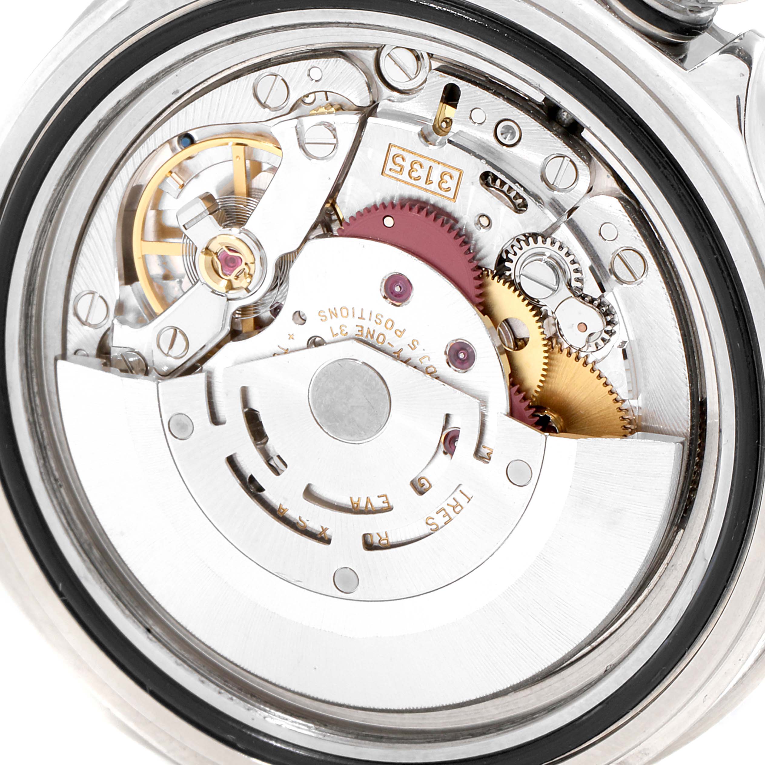 The image shows the back view of a Rolex Submariner 16610LV Men
s Stainless Steel Black Dial 16610LV Men
s Stainless Steel Black Dial watch, specifically its detailed mechanical movement components.