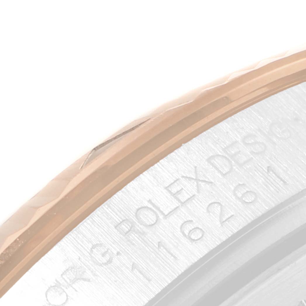 The image shows a close-up of the case back and part of the bezel of a Rolex Turn-o-Graph 116261 Men's Steel and Gold (two tone) White Dial 116261 Men's Steel and Gold (two tone) White Dial watch.