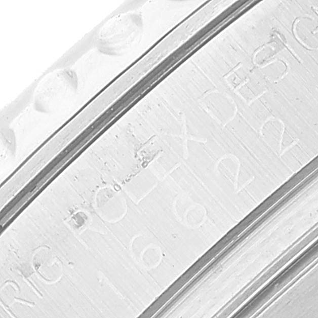 The image shows an extreme close-up of the engraved bezel on a Rolex Yacht-Master 16622 Men's Stainless Steel Silver Dial 16622 Men's Stainless Steel Silver Dial watch.