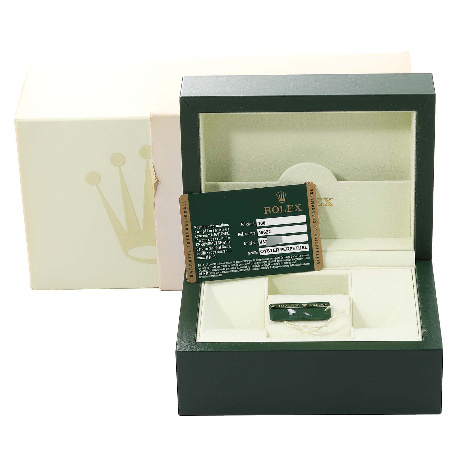 This image shows the box and certification card for the Rolex Yacht-Master 16622 Men's Stainless Steel Silver Dial 16622 Men's Stainless Steel Silver Dial watch, with the card placed inside an open watch box and an outer box in the background.