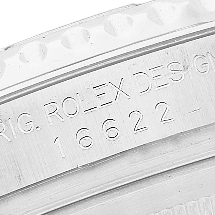 This image shows a close-up of the engraved serial number and model information on the edge of the Rolex Yacht-Master 16622 Men's Stainless Steel Silver Dial 16622 Men's Stainless Steel Silver Dial watch case.