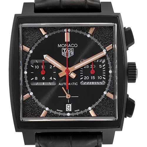 The image shows a front view of the Tag Heuer Monaco watch, highlighting the square face and chronograph details.