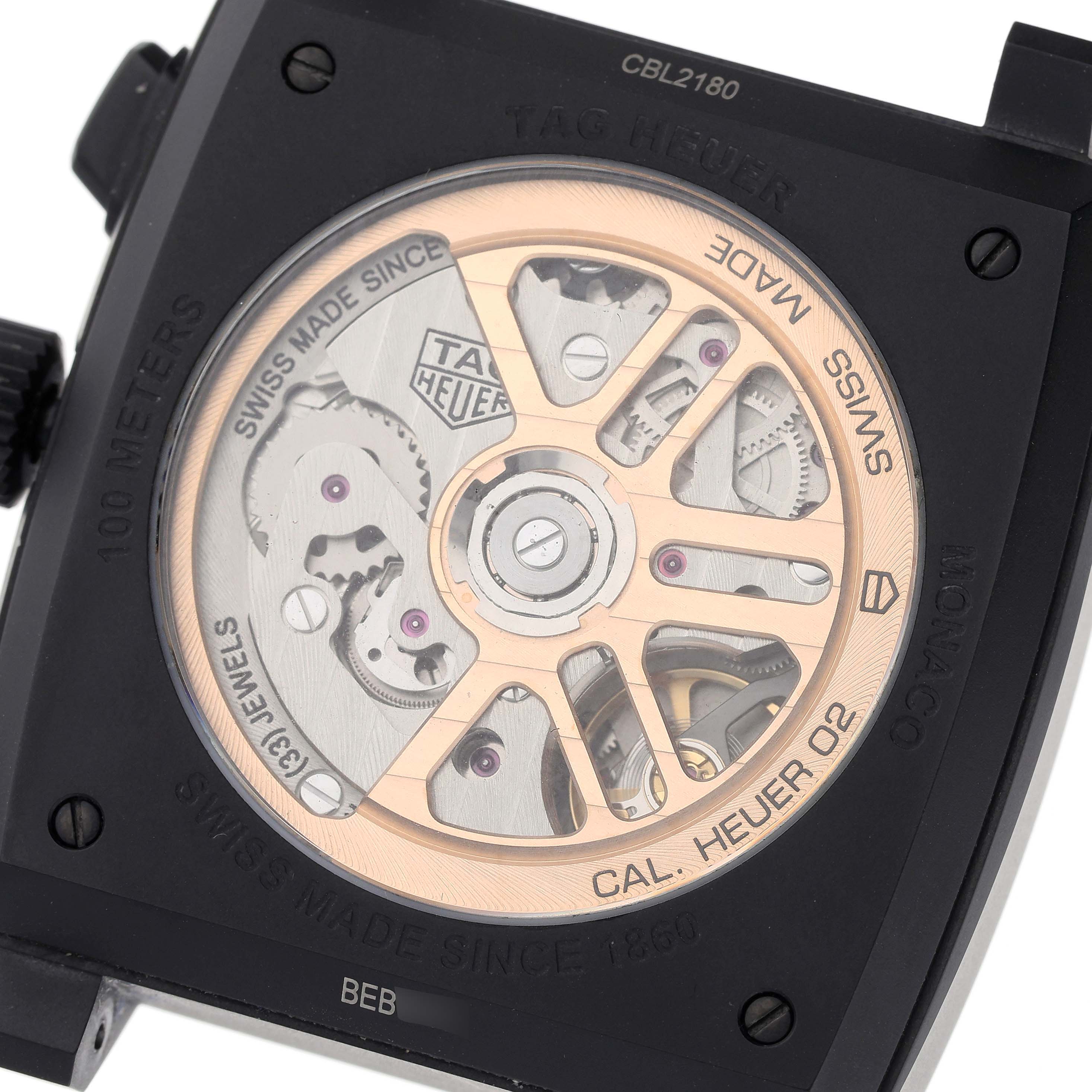 This image shows the back of the Tag Heuer Monaco CBL2180 Men's Titanium Black Dial CBL2180 Men's Titanium Black Dial watch, revealing its internal mechanical components.