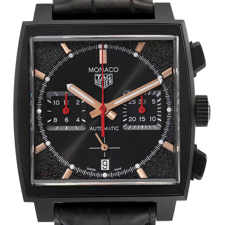 The Tag Heuer Monaco watch is shown from the front, highlighting the dial, subdials, and crown.