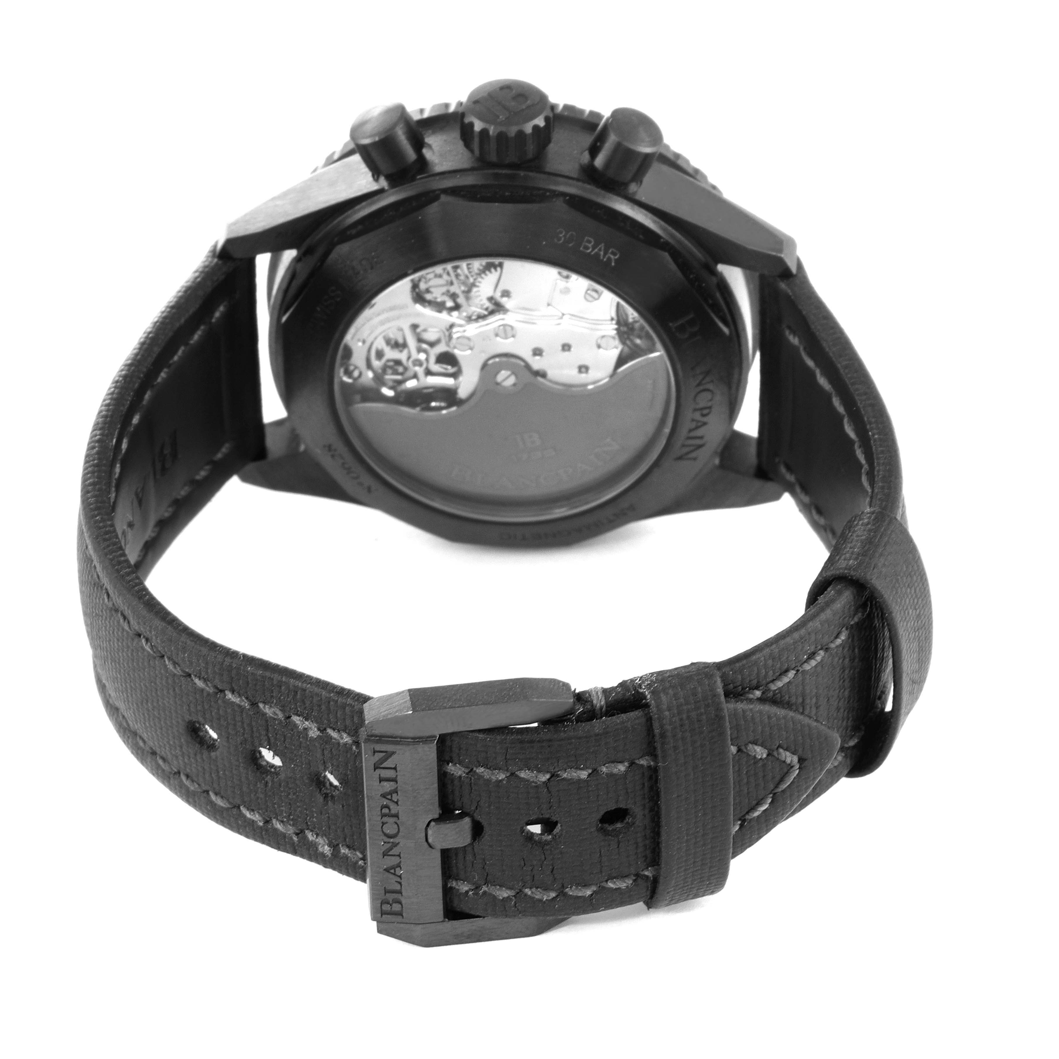 The image shows the back view of the Blancpain Fifty Fathoms 5200-0130-B52A Men's Ceramic Black Dial 5200-0130-B52A Men's Ceramic Black Dial watch, highlighting its mechanical movement and leather strap with a Blancpain buckle.