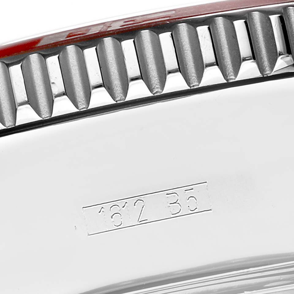 The image shows the side view of a Breitling Superocean A13341 Men's Stainless Steel Black Dial A13341 Men's Stainless Steel Black Dial watch, focusing on the bezel and part of the case with visible engravings.