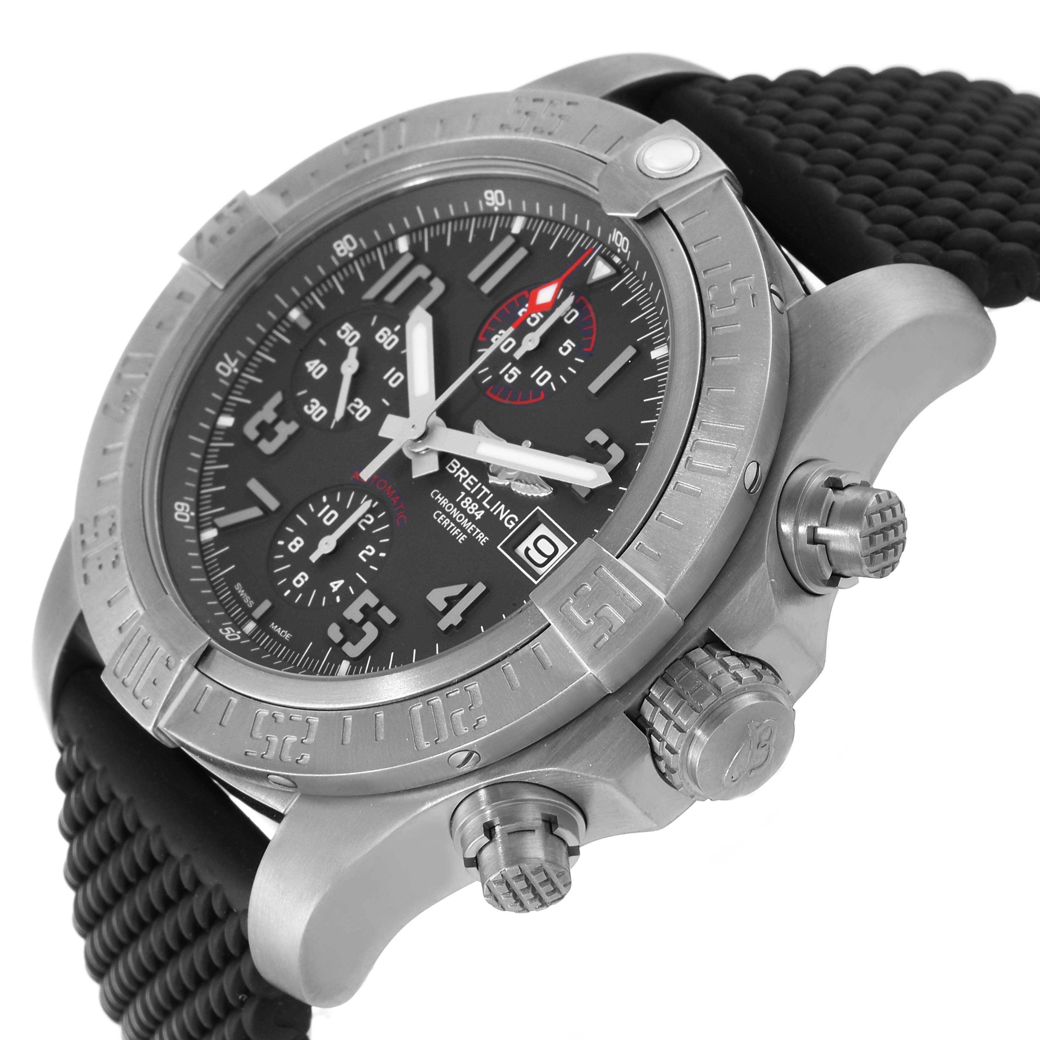 The image shows a close-up, angled view of a Breitling Avenger E13383 Men's Titanium Grey Dial E13383 Men's Titanium Grey Dial watch, highlighting its face, bezel, crown, pushers, and black strap.
