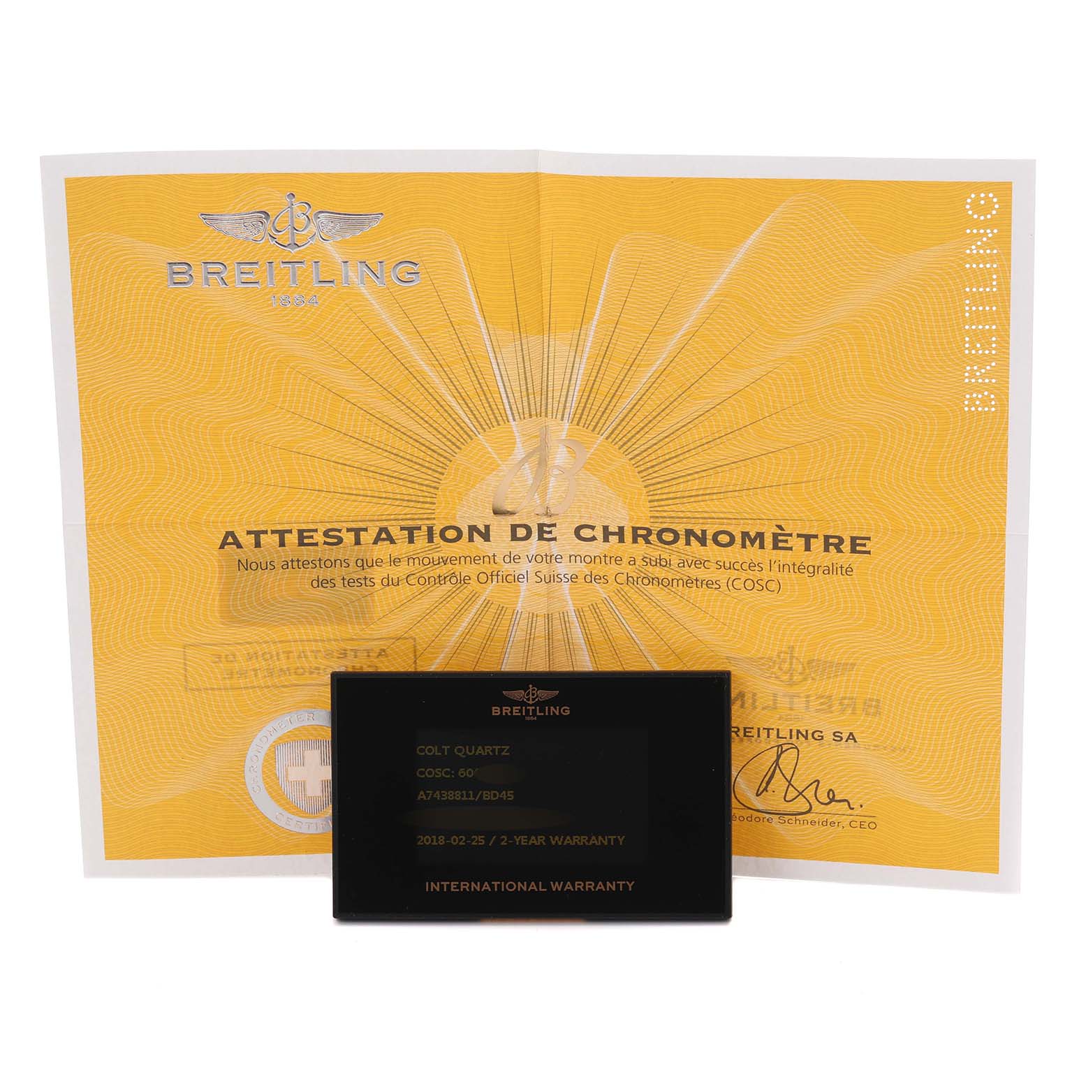 The image shows a Breitling Colt A7438811/BD45-SS Men's Stainless Steel Black Dial A7438811/BD45-SS Men's Stainless Steel Black Dial model warranty card and a certificate, viewed from the front, displaying text and logos.