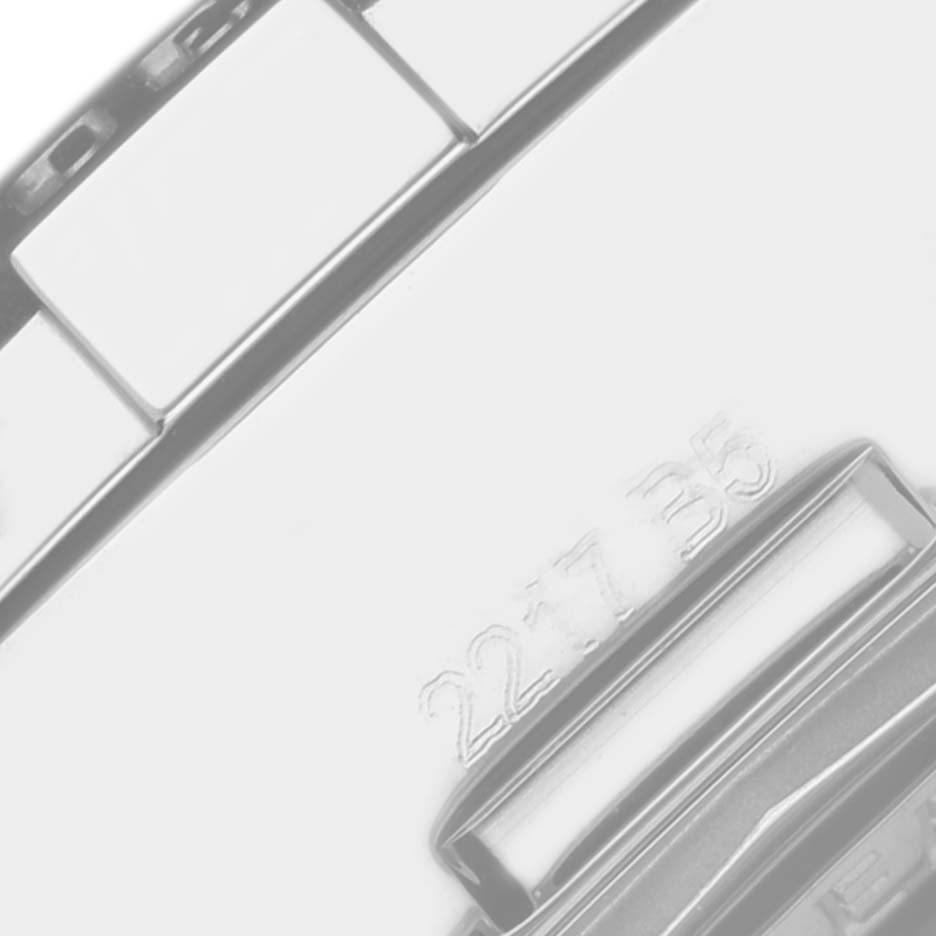 The image shows a close-up of the bracelet clasp of the Breitling Colt A73388 Men
s Stainless Steel White Dial A73388 Men
s Stainless Steel White Dial watch, featuring part of the deployment clasp and engraved numbers.