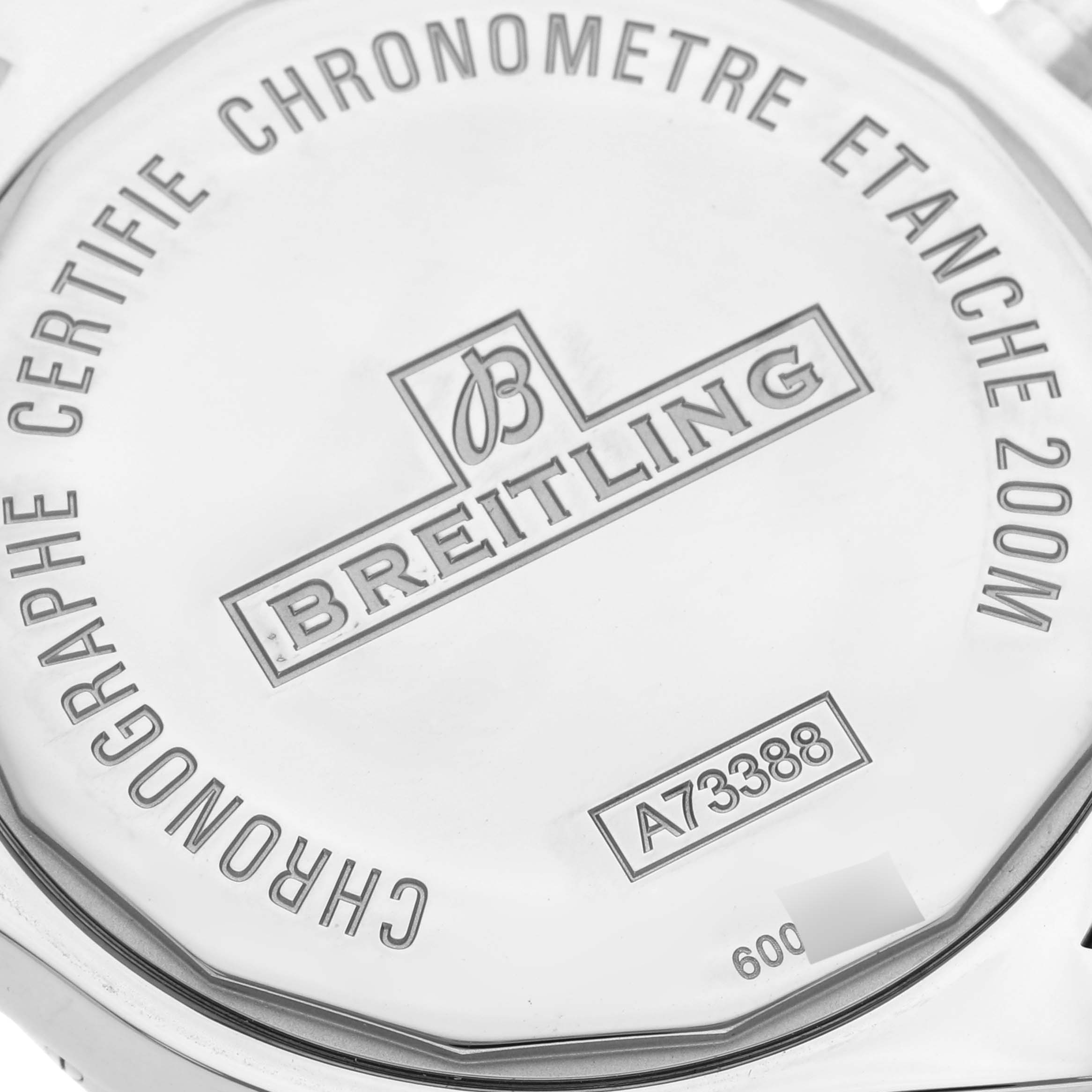 The image shows the back case of the Breitling Colt A73388 Men
s Stainless Steel White Dial A73388 Men
s Stainless Steel White Dial watch, displaying model details and branding.