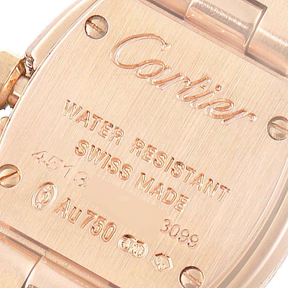 This is the back case of a Cartier Baignoire W8000015 Women's Rose Gold Silver Dial W8000015 Women's Rose Gold Silver Dial watch, displaying engravings and the bracelet attachment.