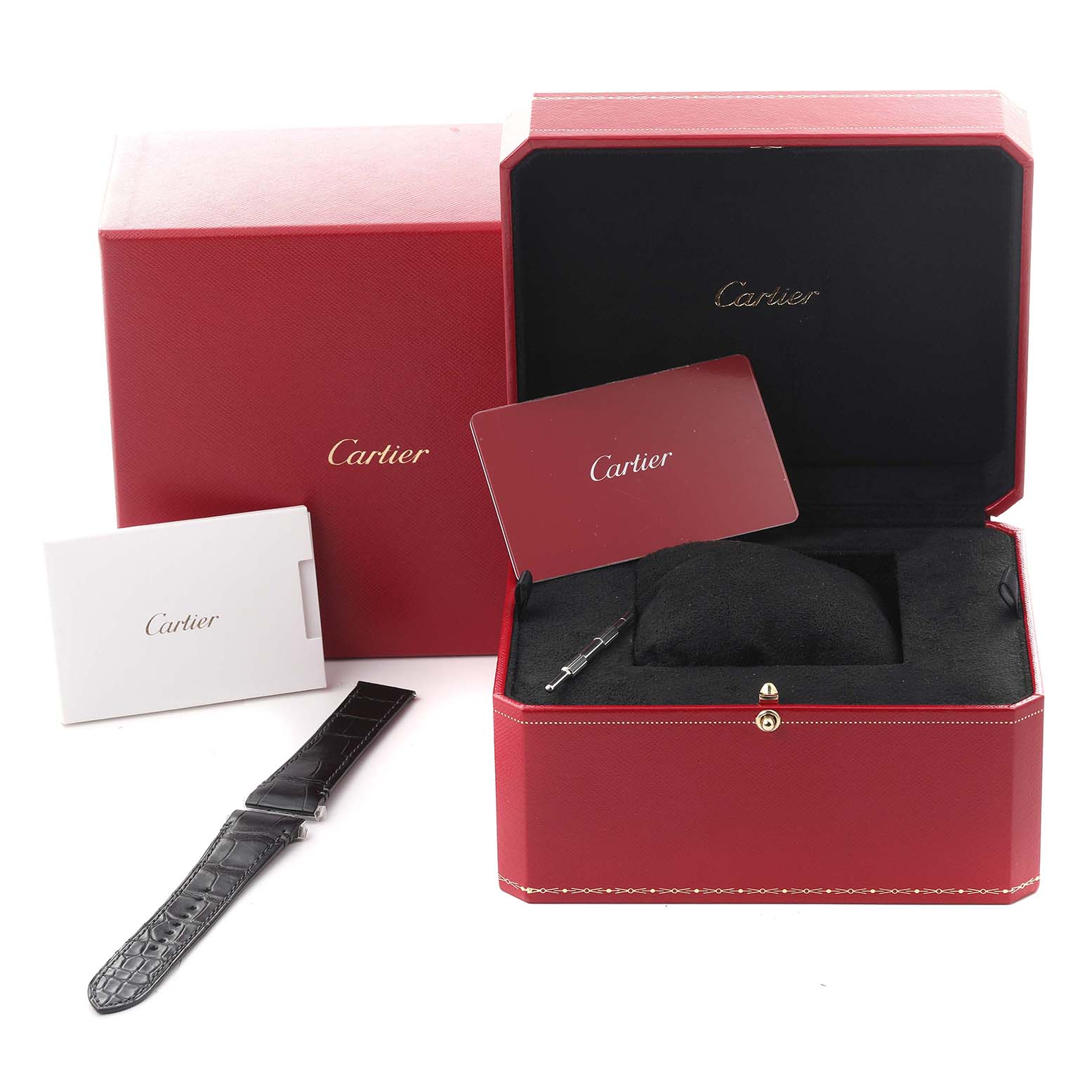 The image shows a Cartier Santos WSSA0039 Men's Stainless Steel Black Dial WSSA0039 Men's Stainless Steel Black Dial watch box, warranty card, additional strap, and tool, seen from the front angle.