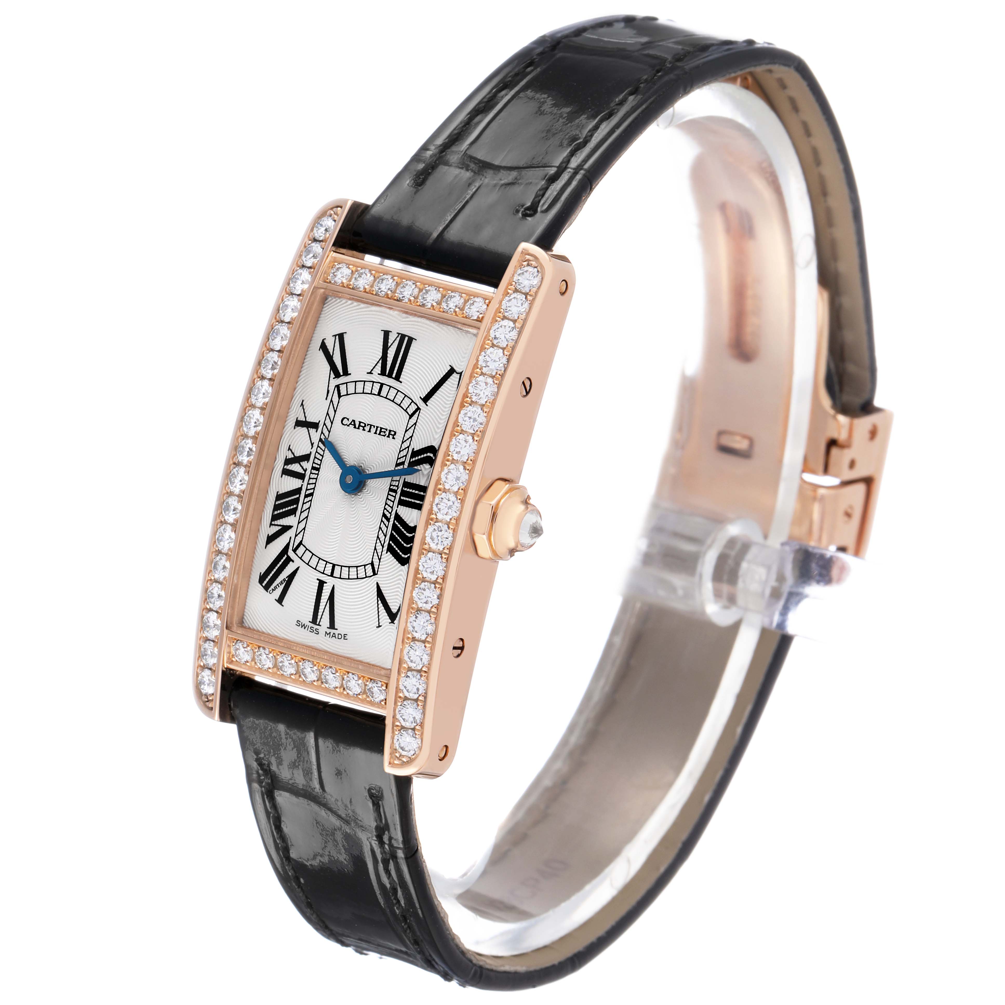 The Cartier Tank Americaine WJTA0002 Women's Rose Gold Silver Dial watch is shown at a slight angle, highlighting its rectangular face, side crown, and leather strap.