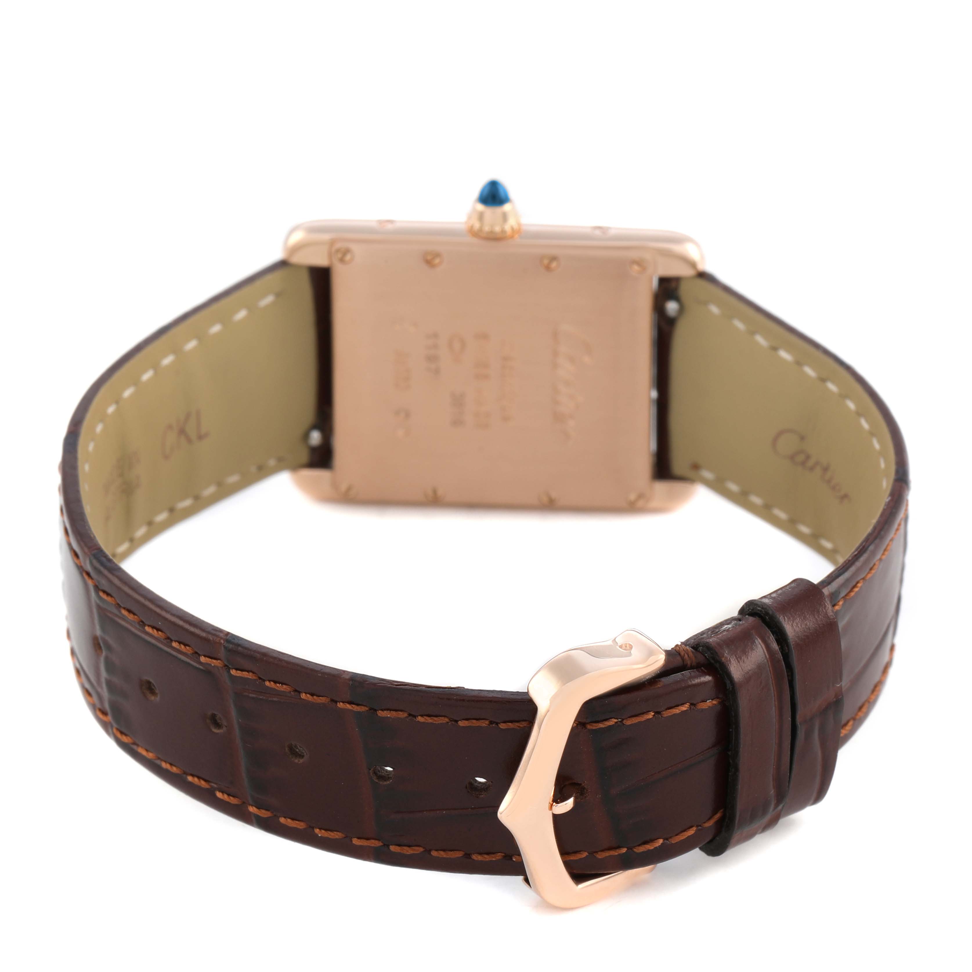 The image shows the back view of a Cartier Tank Louis WGTA0011 Men's Rose Gold Silver Dial watch, highlighting the case back, strap, and clasp.