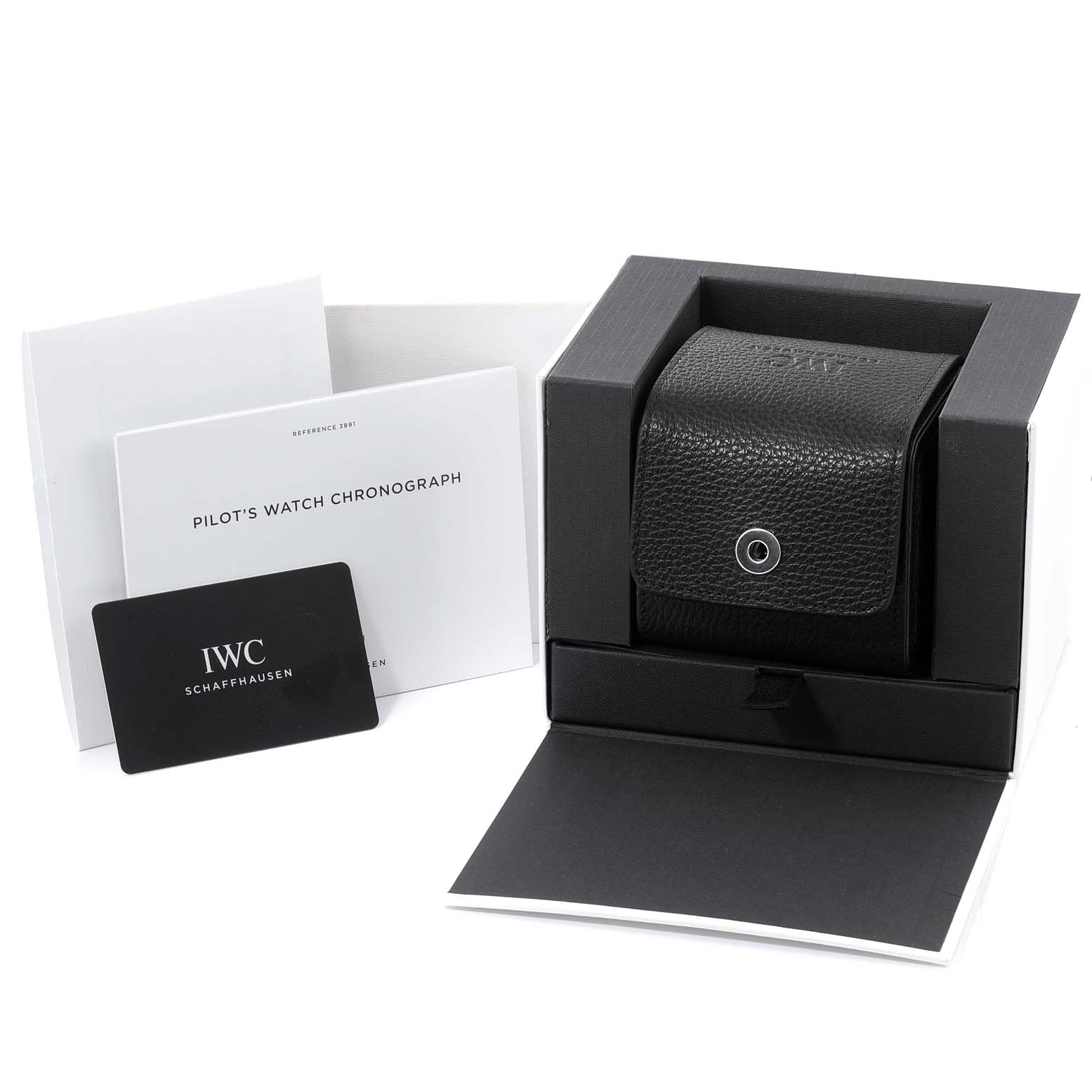 The image shows the packaging for an IWC Pilot IW389101 Men's Ceramic Black Dial IW389101 Men's Ceramic Black Dial watch, including the watch box, instruction manuals, and warranty card.