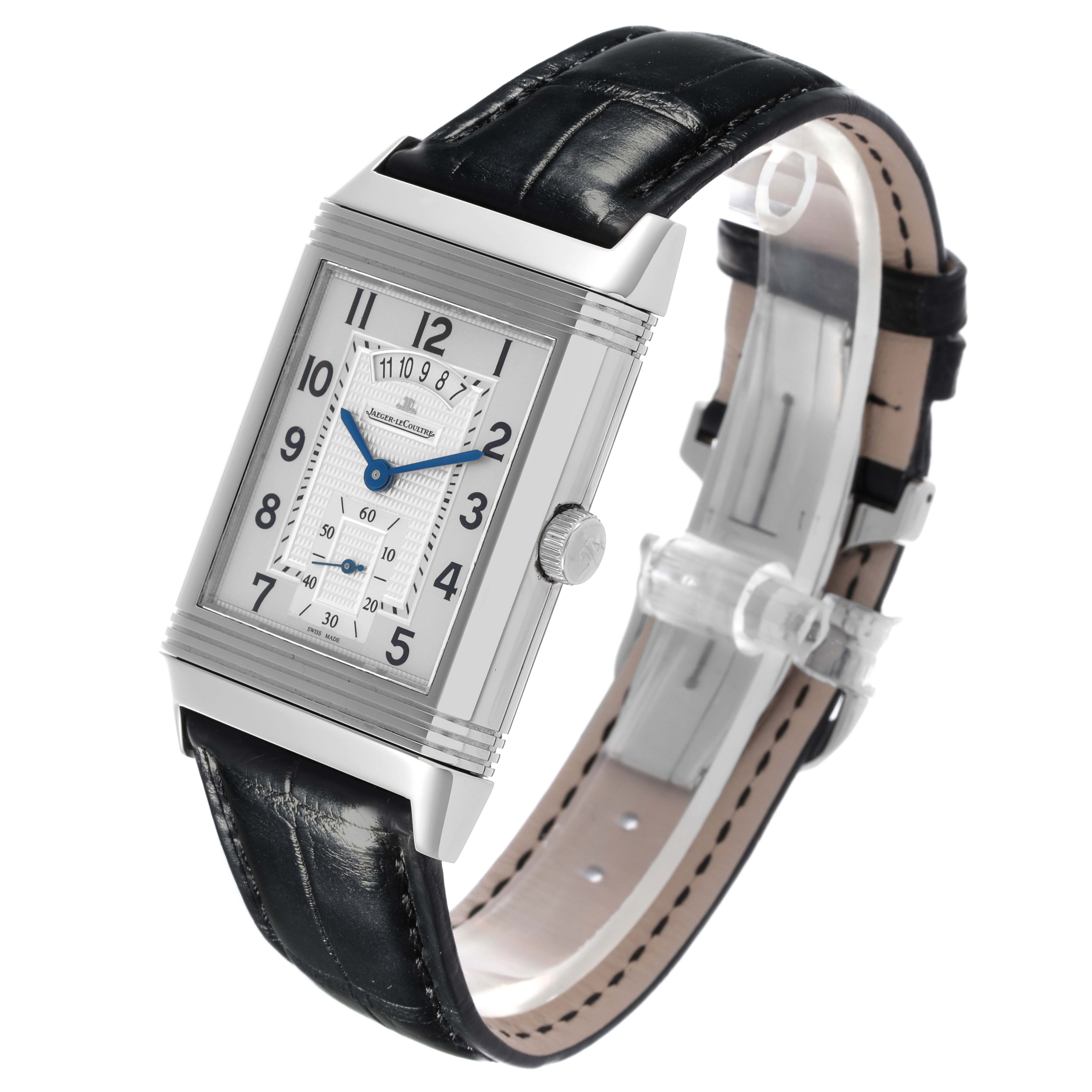 The Jaeger-LeCoultre Reverso watch is shown at a three-quarter angle, displaying the face, crown, and leather strap.